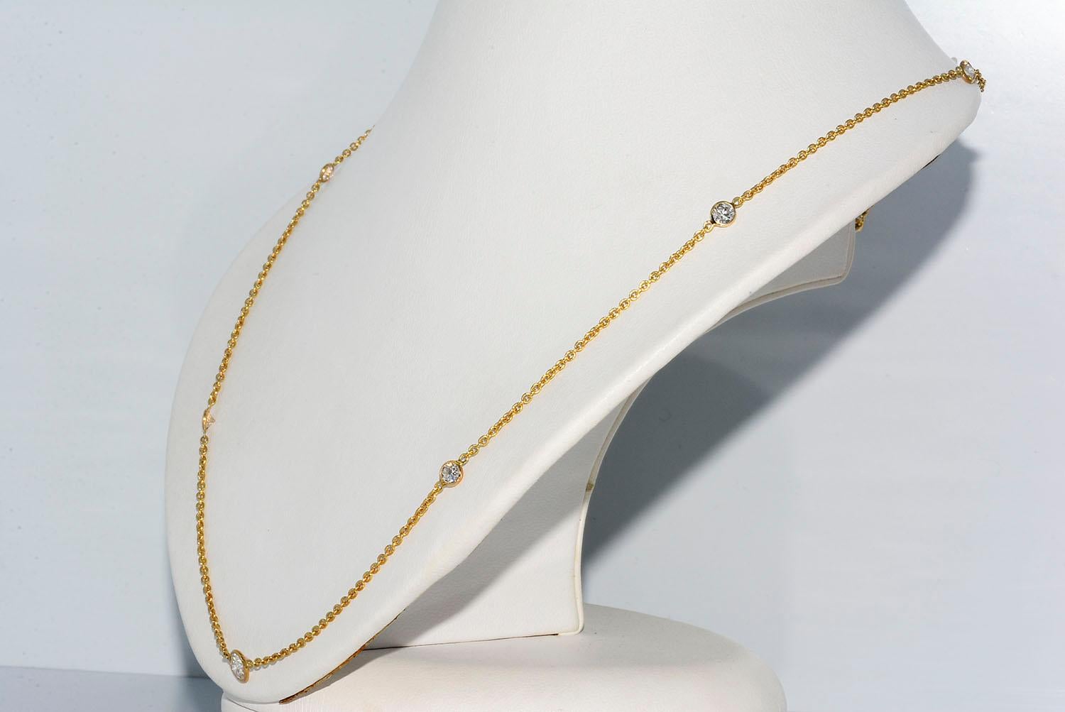 1.56 CT Diamonds By The Yard Necklace 18k Yellow Gold

Center Round Diamond .46 ct G VS2
6 Round Diamonds Totaling 1.10 ct G VS2
4.11 Grams
Length 19 Inches
