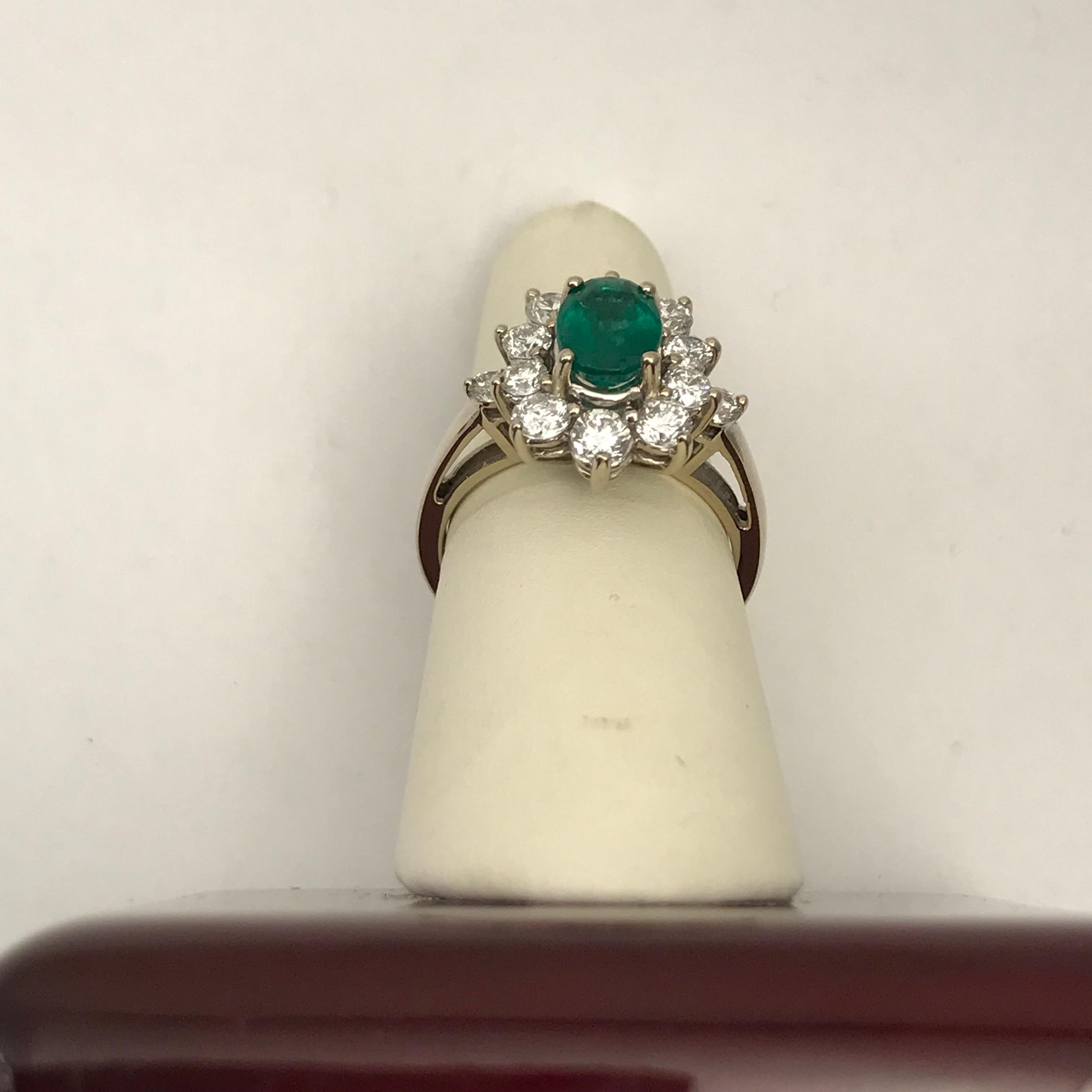 1.56 Oval Cut Emerald with 1.06 Carat of Diamond Cocktail Ring For Sale 5