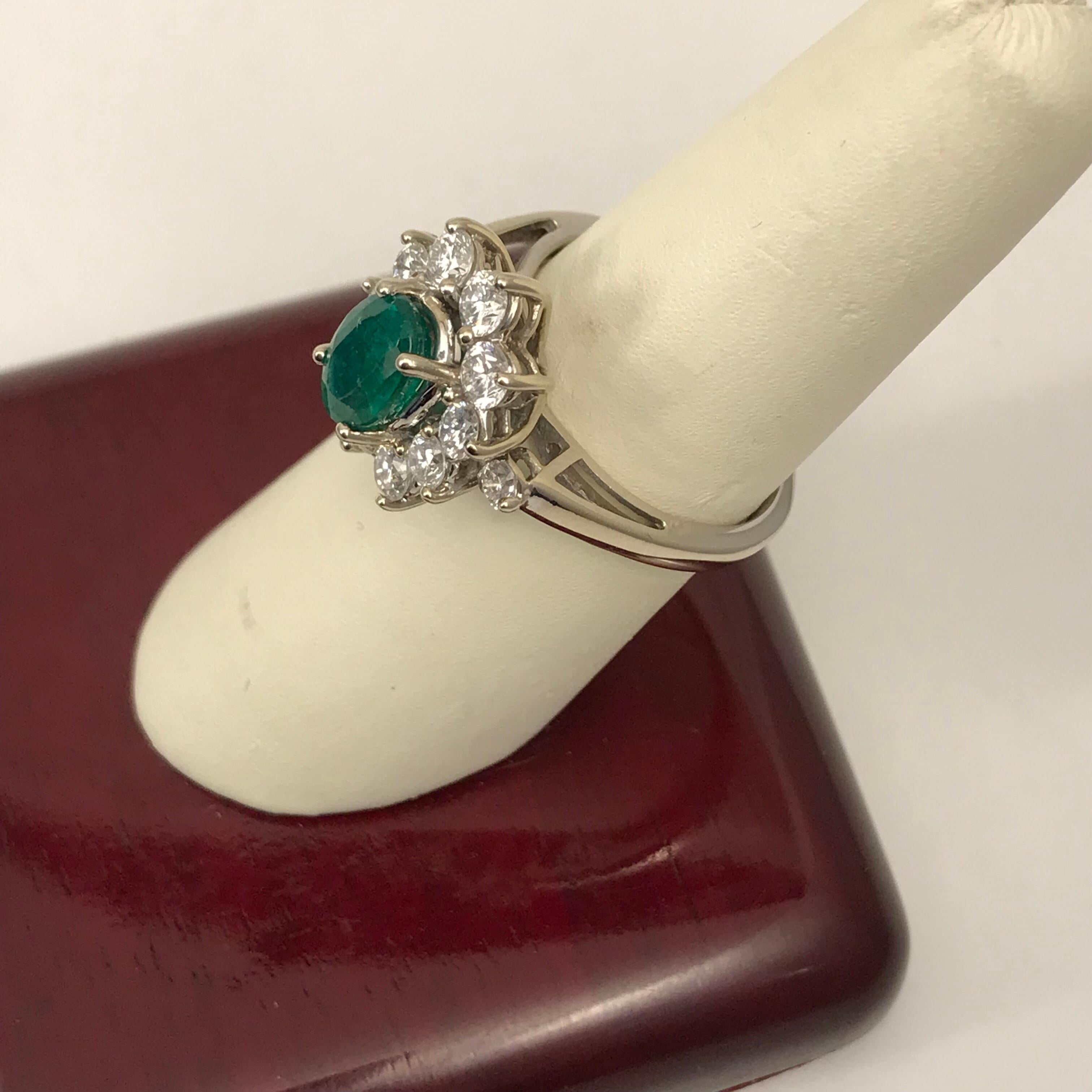 1.56 Oval Cut Emerald with 1.06 Carat of Diamond Cocktail Ring For Sale 6