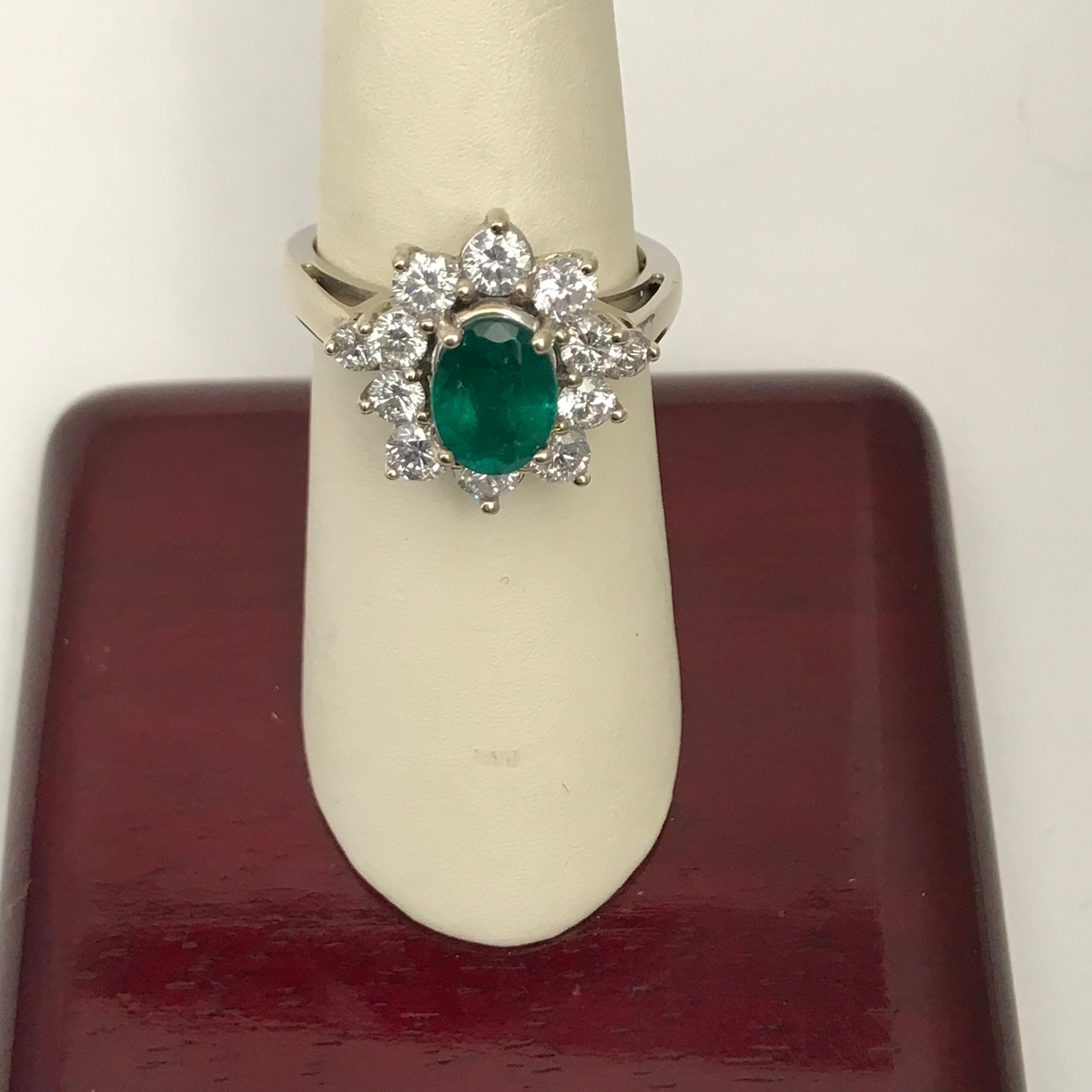1.56 Oval Cut Emerald with 1.06 Carat of Diamond Cocktail Ring For Sale 9