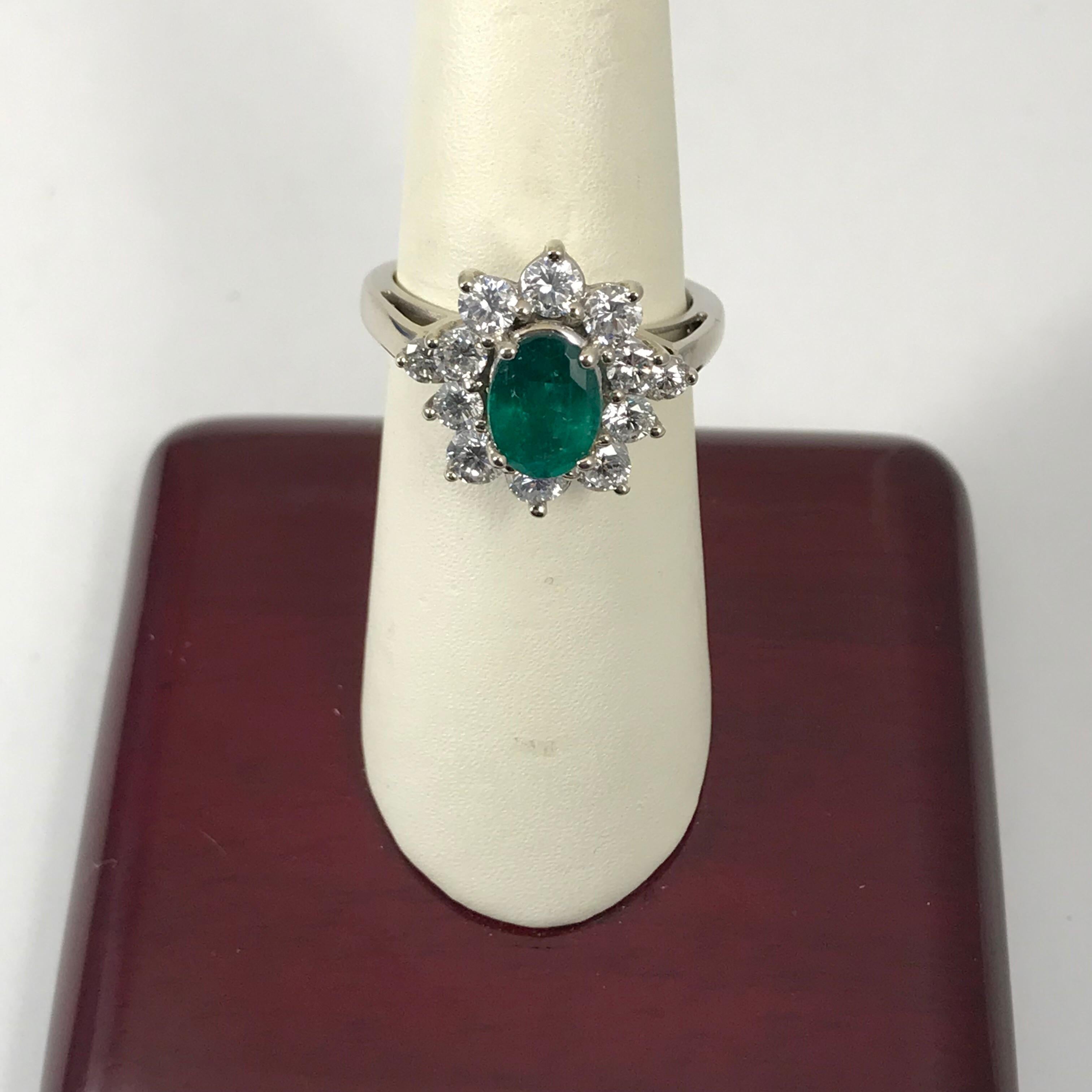 Women's 1.56 Oval Cut Emerald with 1.06 Carat of Diamond Cocktail Ring For Sale