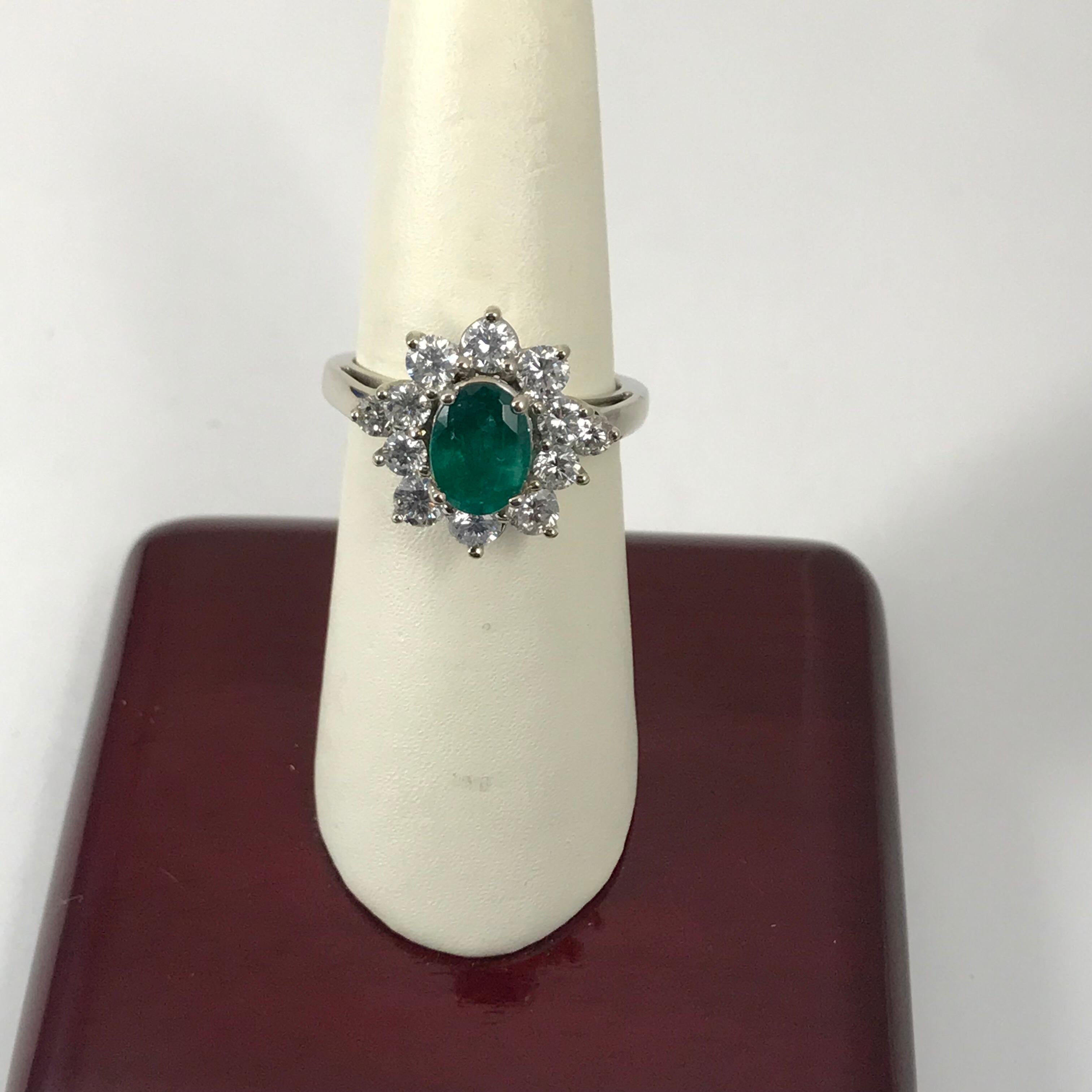1.56 Oval Cut Emerald with 1.06 Carat of Diamond Cocktail Ring For Sale 1