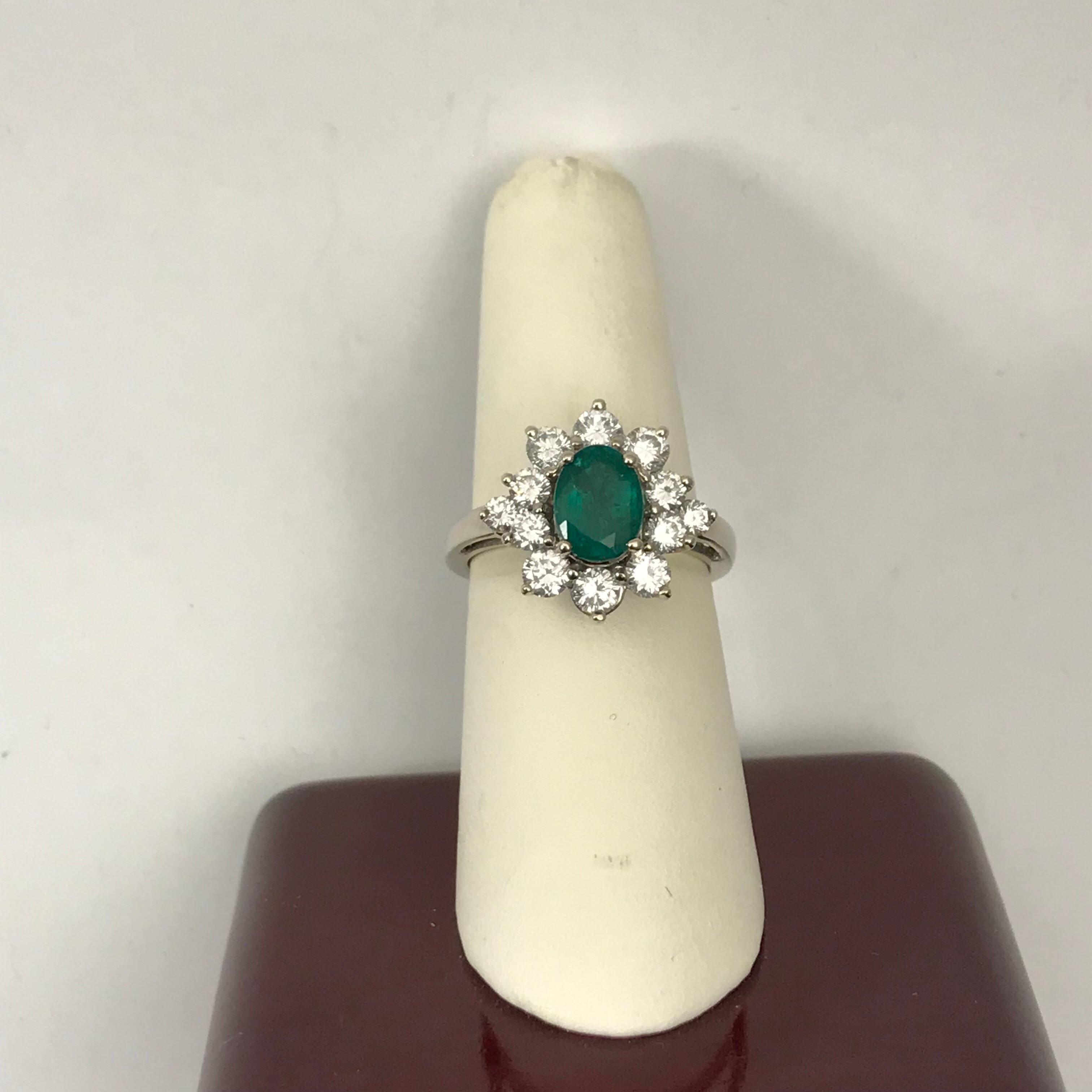 1.56 Oval Cut Emerald with 1.06 Carat of Diamond Cocktail Ring For Sale 2
