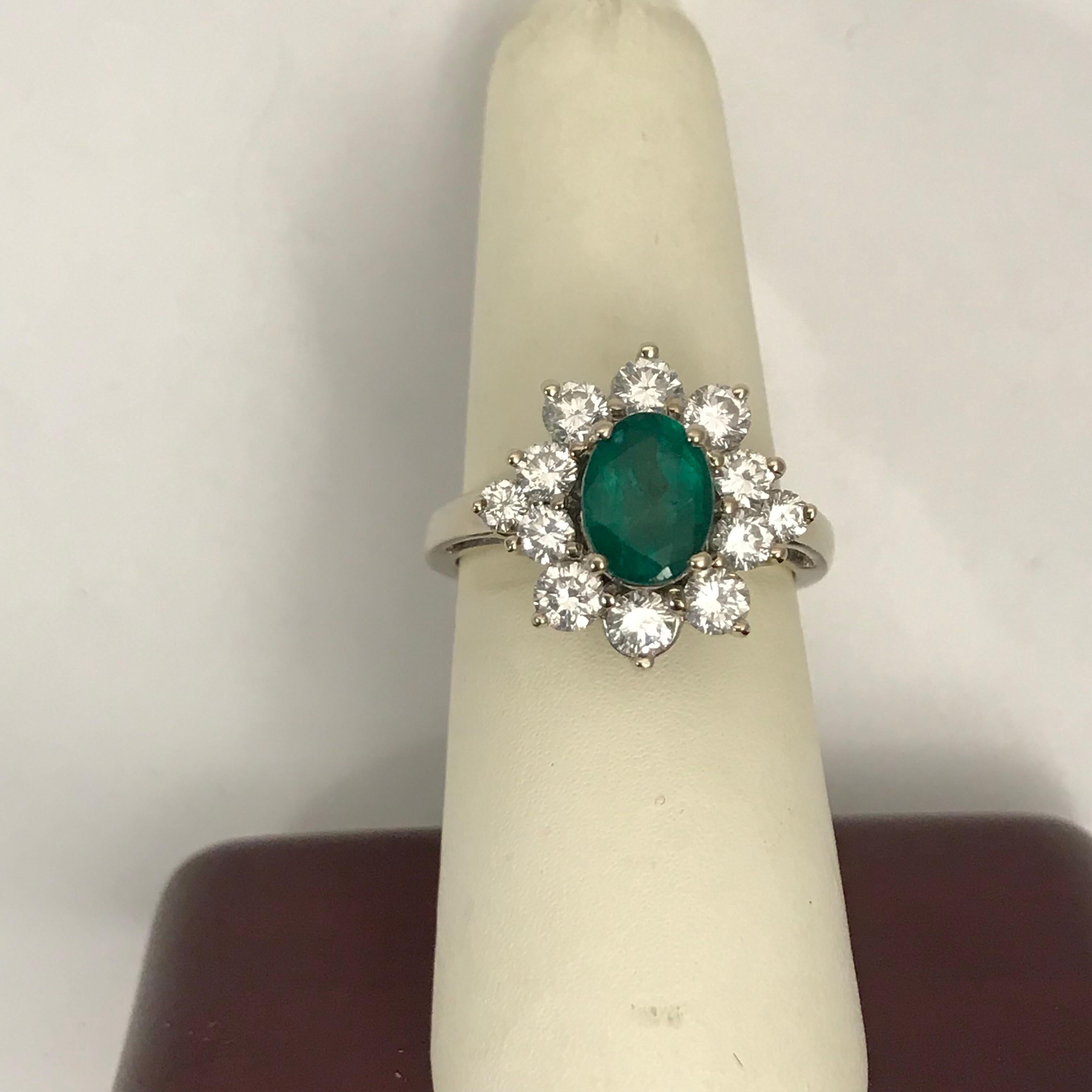 1.56 Oval Cut Emerald with 1.06 Carat of Diamond Cocktail Ring For Sale 3