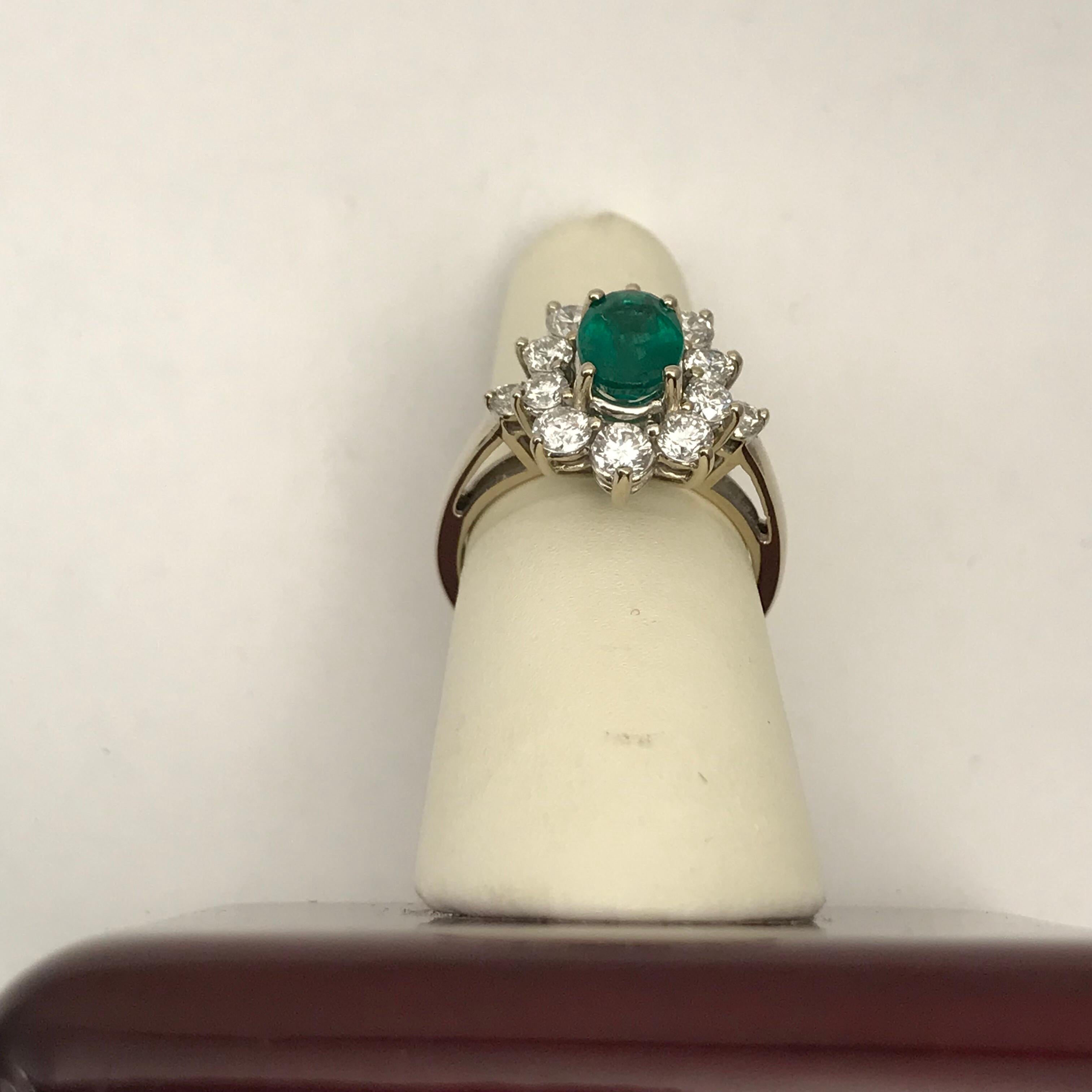 1.56 Oval Cut Emerald with 1.06 Carat of Diamond Cocktail Ring For Sale 4