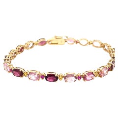 Bracciale in oro giallo 14 carati con tormalina naturale e zaffiro da 15,63 carati