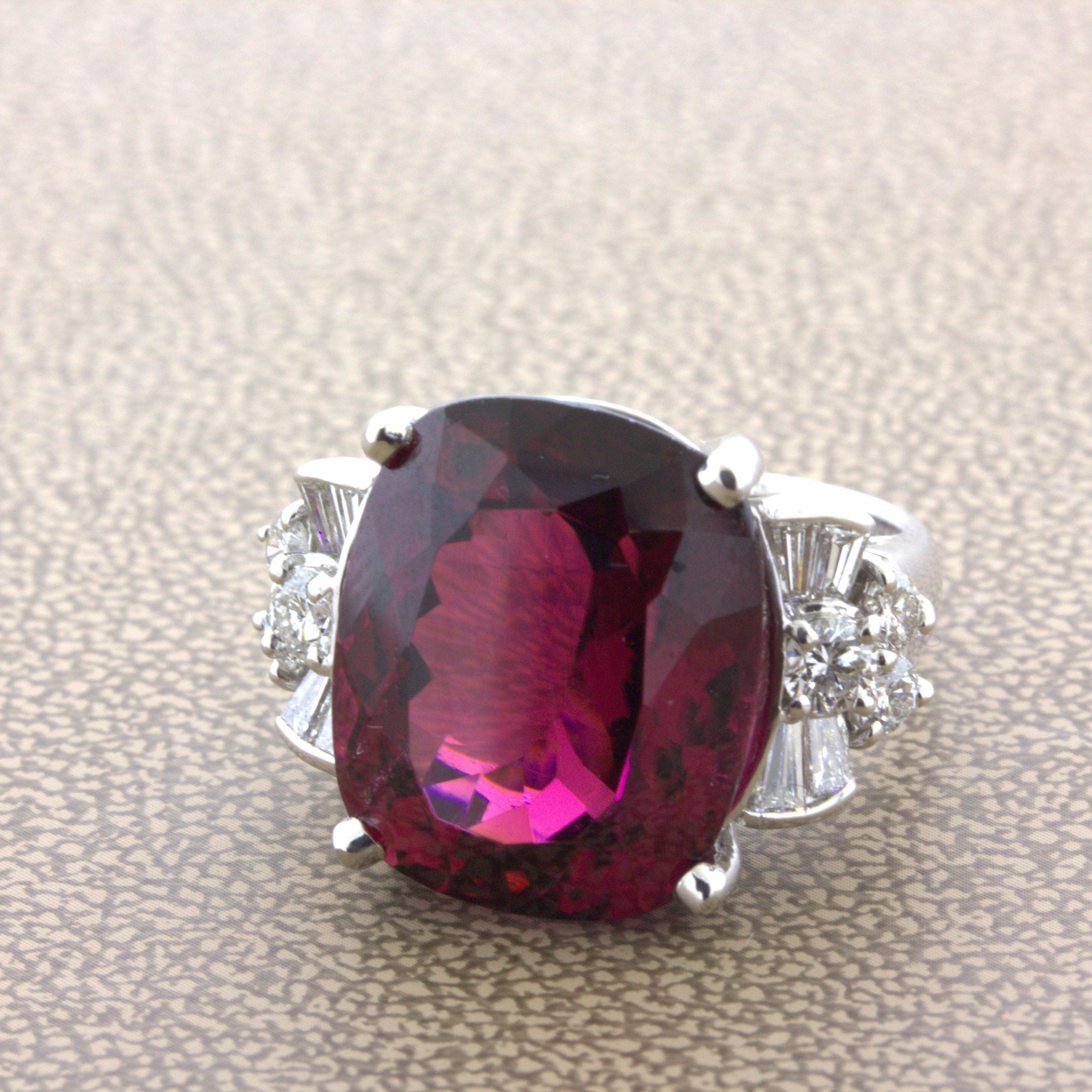 A superb gem rhodolite garnet weighing an impressive 15.64 carats. What makes this gem special is the combination of its large size, its clarity, and its color. It is completely eye clean, even with a jewelers loupe no inclusions can be seen. Adding