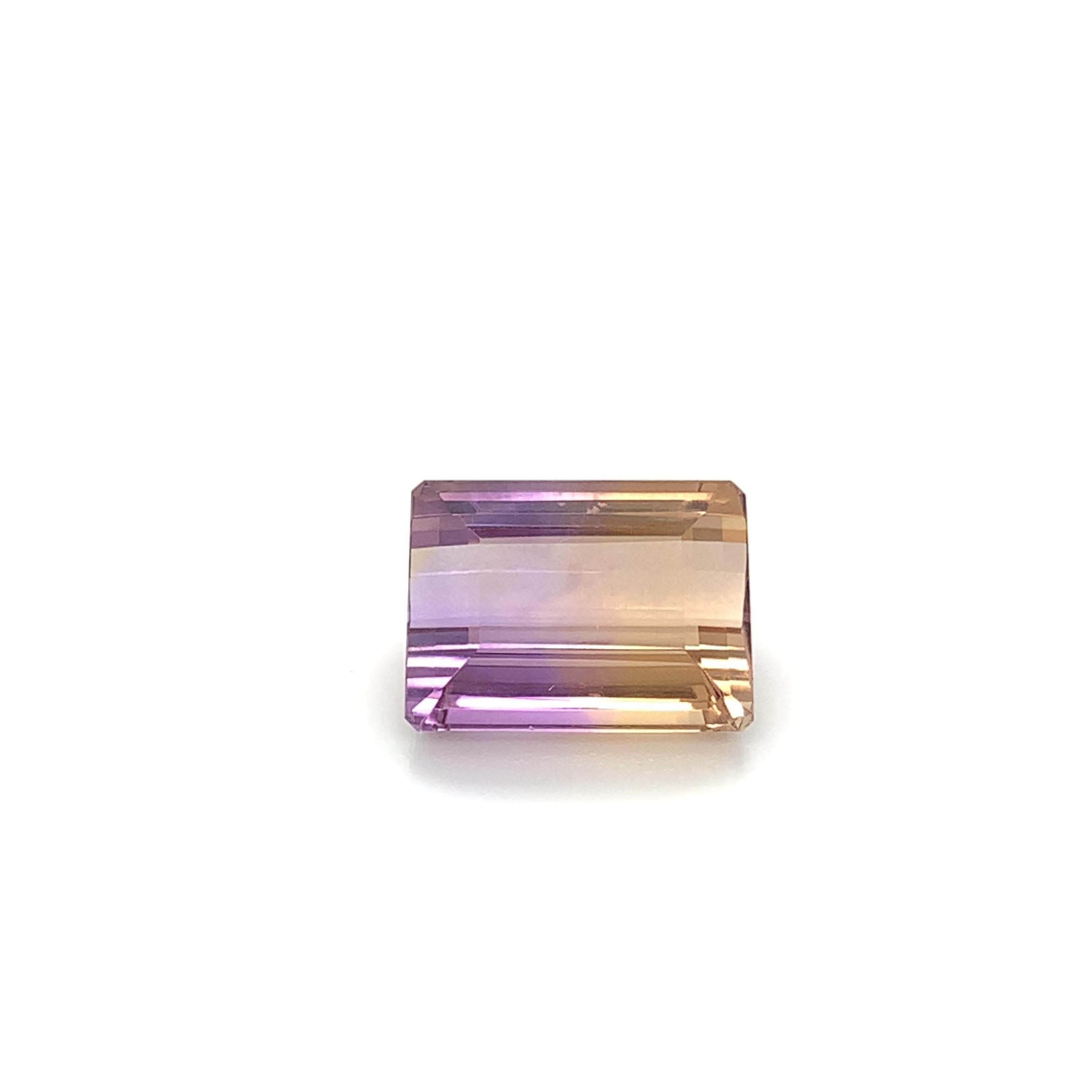 Laker and Vikiing fans will love this purple and gold ametrine, a gemstone with a combination of both bright amethyst and golden citrine! This 15.64 carat emerald-cut ametrine has a nearly 50-50 distribution of bright purple and gold. No need to