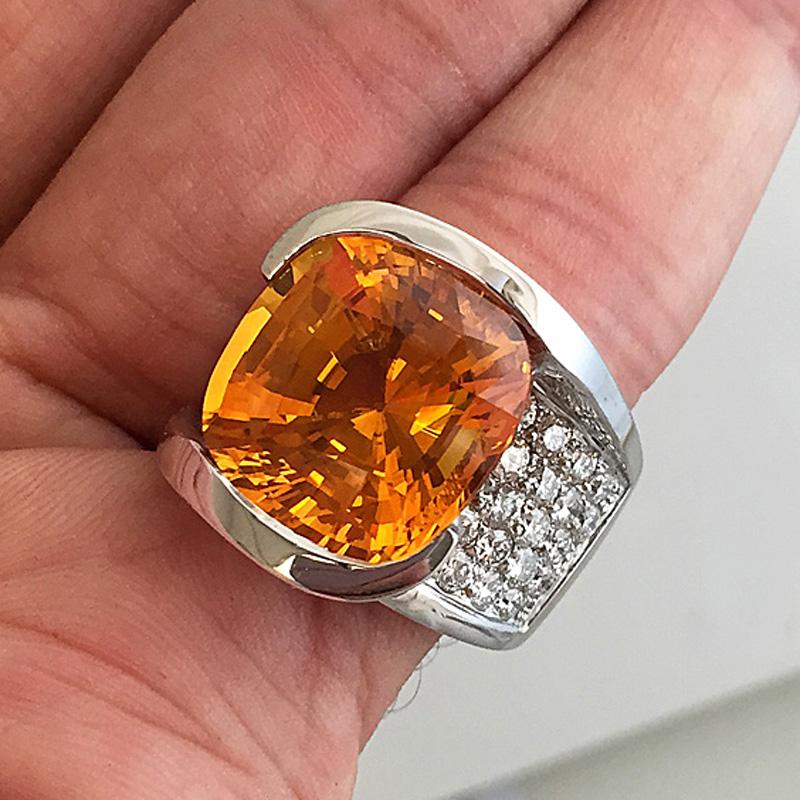 Contemporary 15.65 Carat Huge Cushion Natural Honey Orange Sapphire and Diamond Ring For Sale