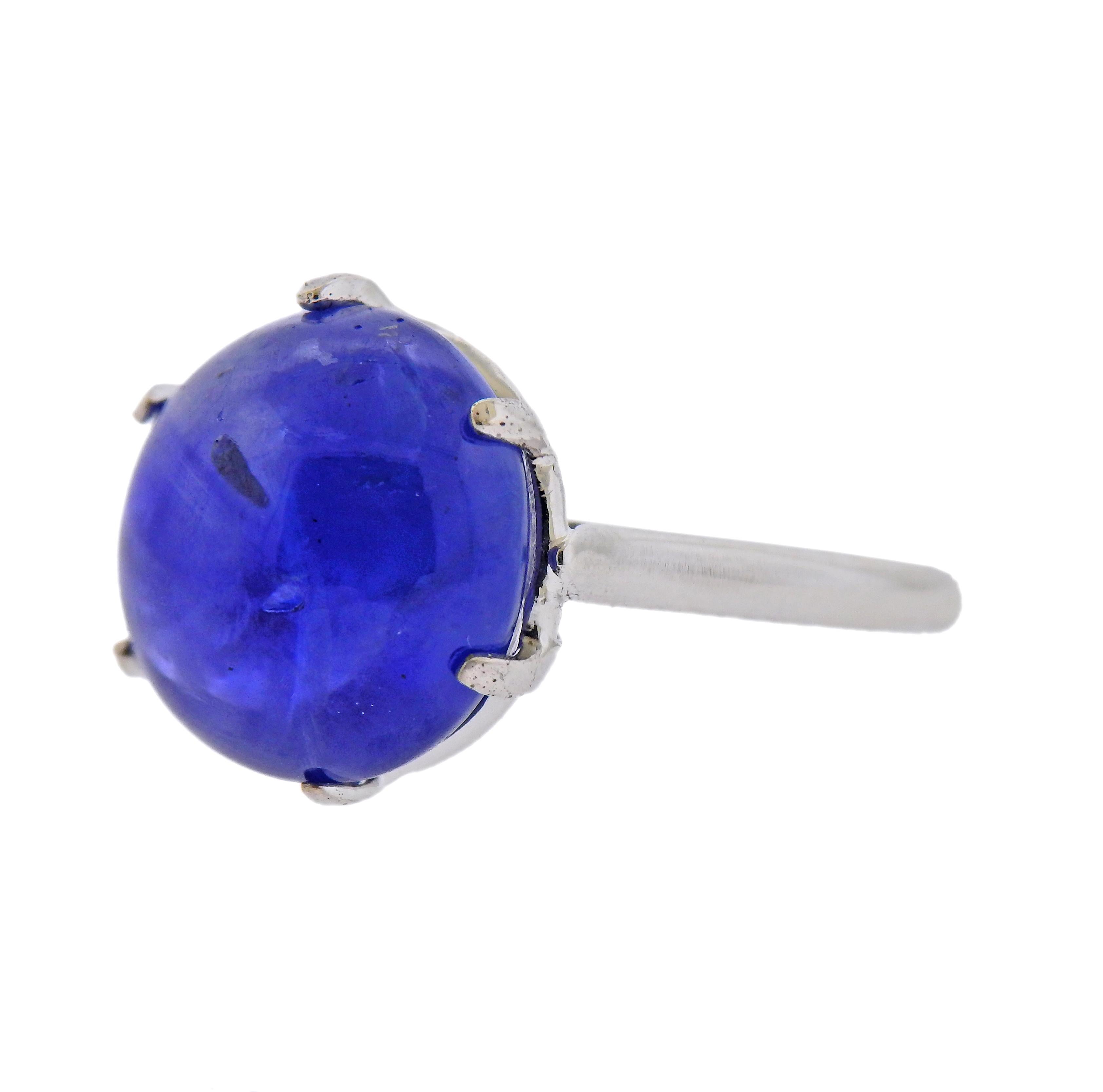 18k white gold ring, set with a no heat Burma sapphire cabochon - approx. 15.65ct, measuring approx. 13.45 x 12.83 x 8.4mm. Marked with a gold assay mark on the outside of the shank. Weight - 7.7 grams. 