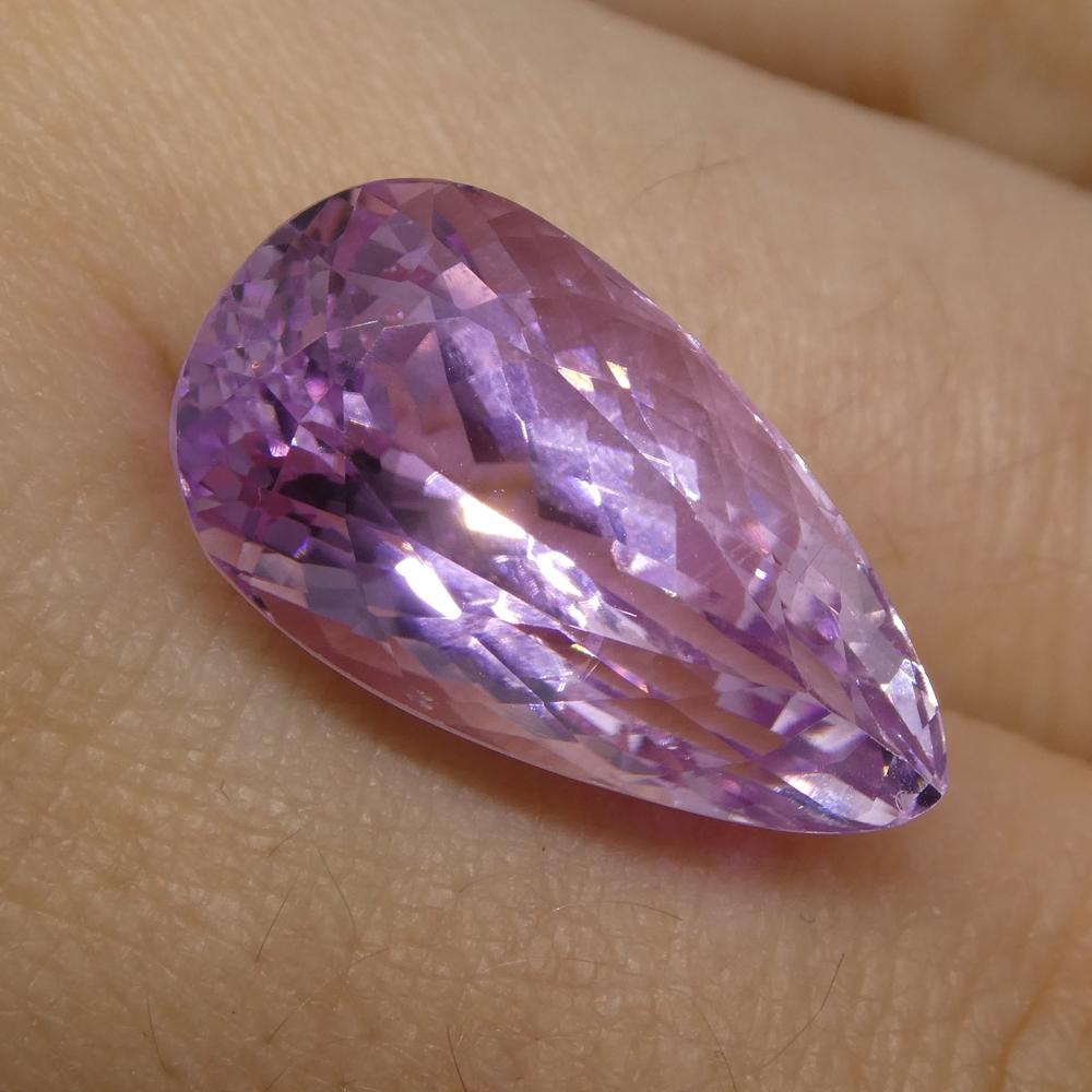 Description:

Gem Type: Kunzite
Number of Stones: 1
Weight: 15.66 cts
Measurements: 20x11.30x10.50mm
Shape: Pear
Cutting Style Crown: Modified Brilliant Cut
Cutting Style Pavilion: Mixed Cut
Transparency: Transparent
Clarity: Very Slightly Included:
