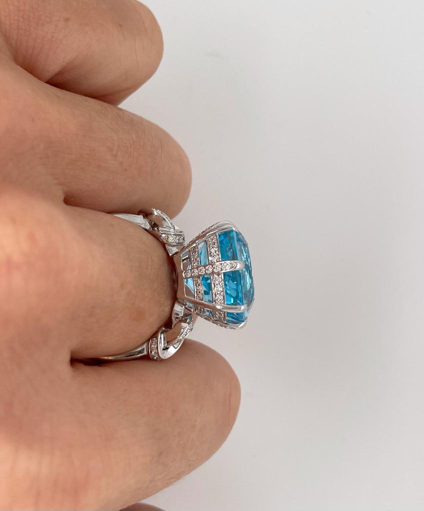 For Sale:  15.66ct Blue Topaz and Diamond Forget Me Knot Ring 15