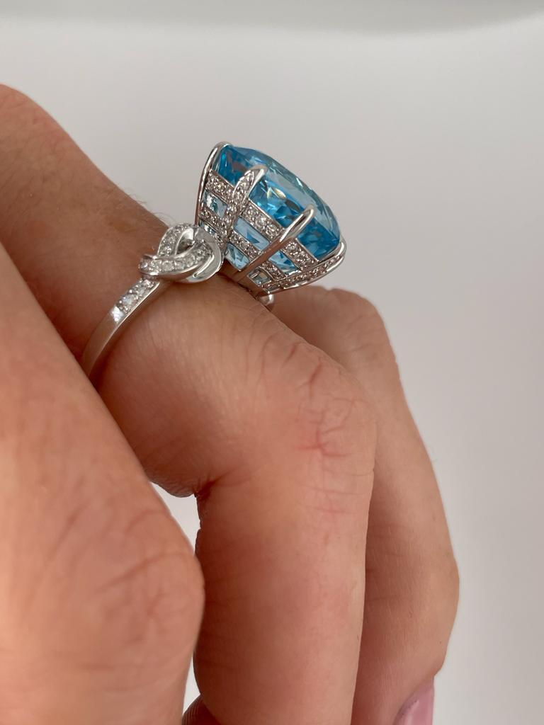 For Sale:  15.66ct Blue Topaz and Diamond Forget Me Knot Ring 16