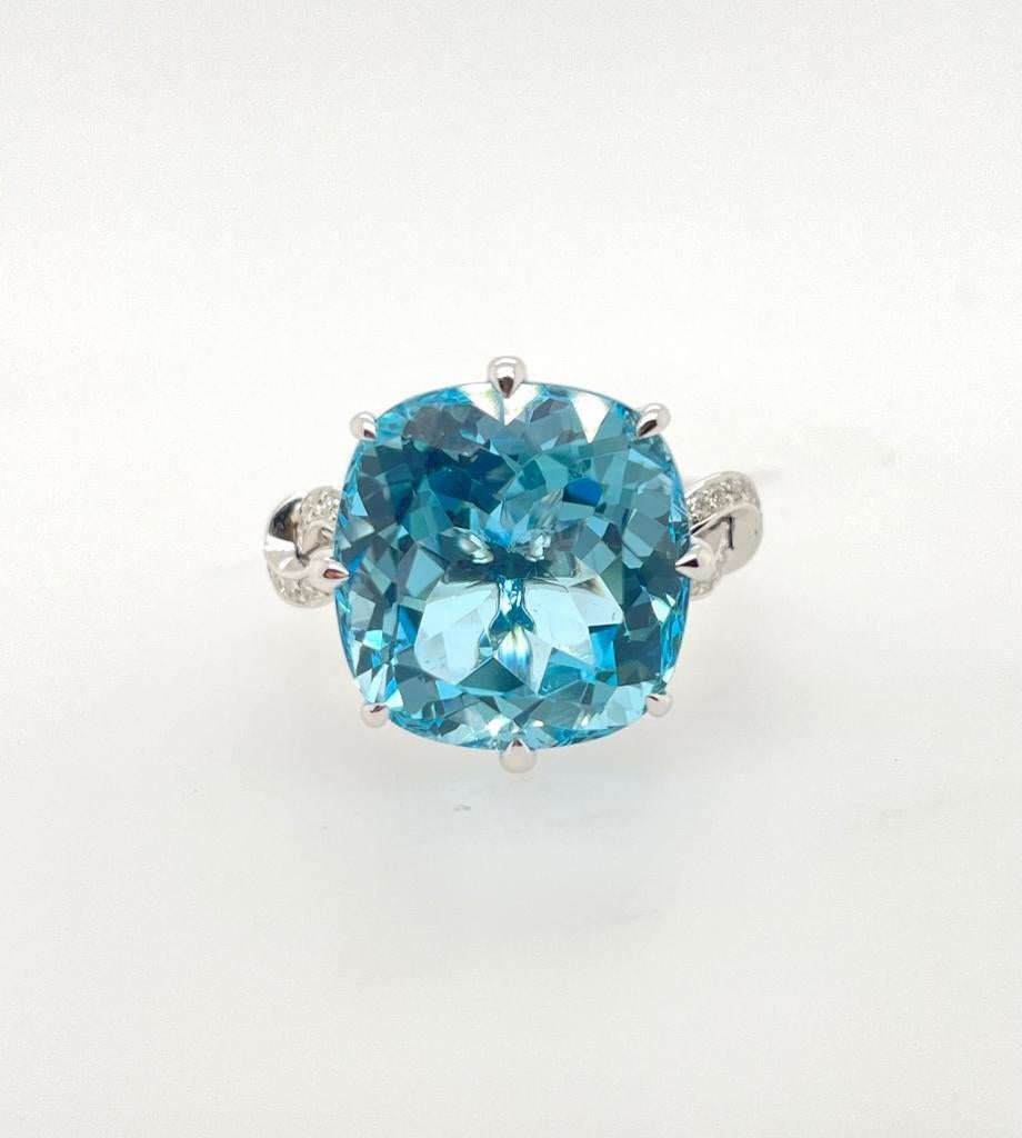 For Sale:  15.66ct Blue Topaz and Diamond Forget Me Knot Ring 7