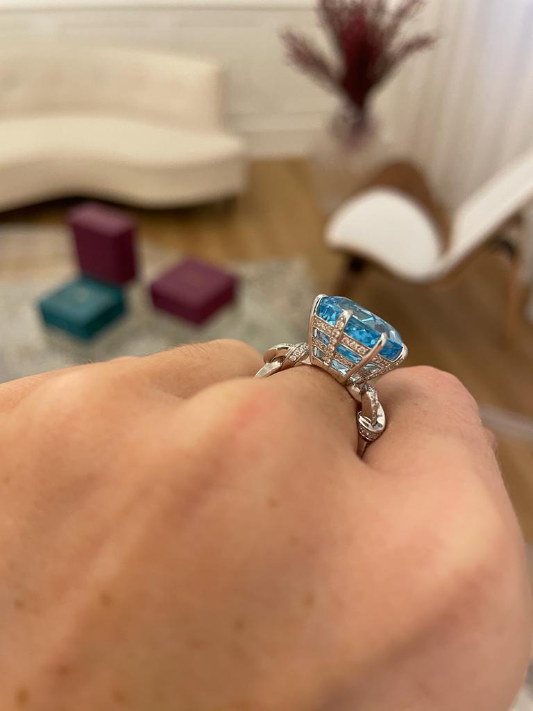 For Sale:  15.66ct Blue Topaz and Diamond Forget Me Knot Ring 9