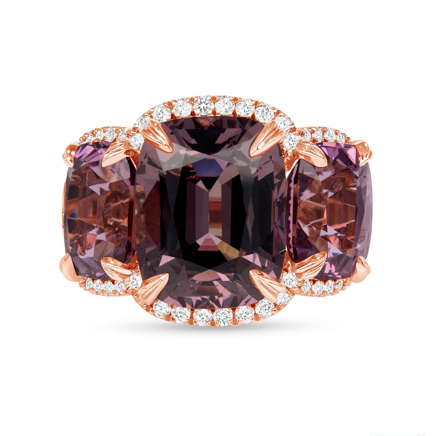 18K rose gold ring, featuring three untreated Burmese Spinels totaling 15.67 carats, accented by two cadillac-cut diamonds totaling 0.35ct and round brilliant-cut diamonds totaling 0.82ct. GIA certified.