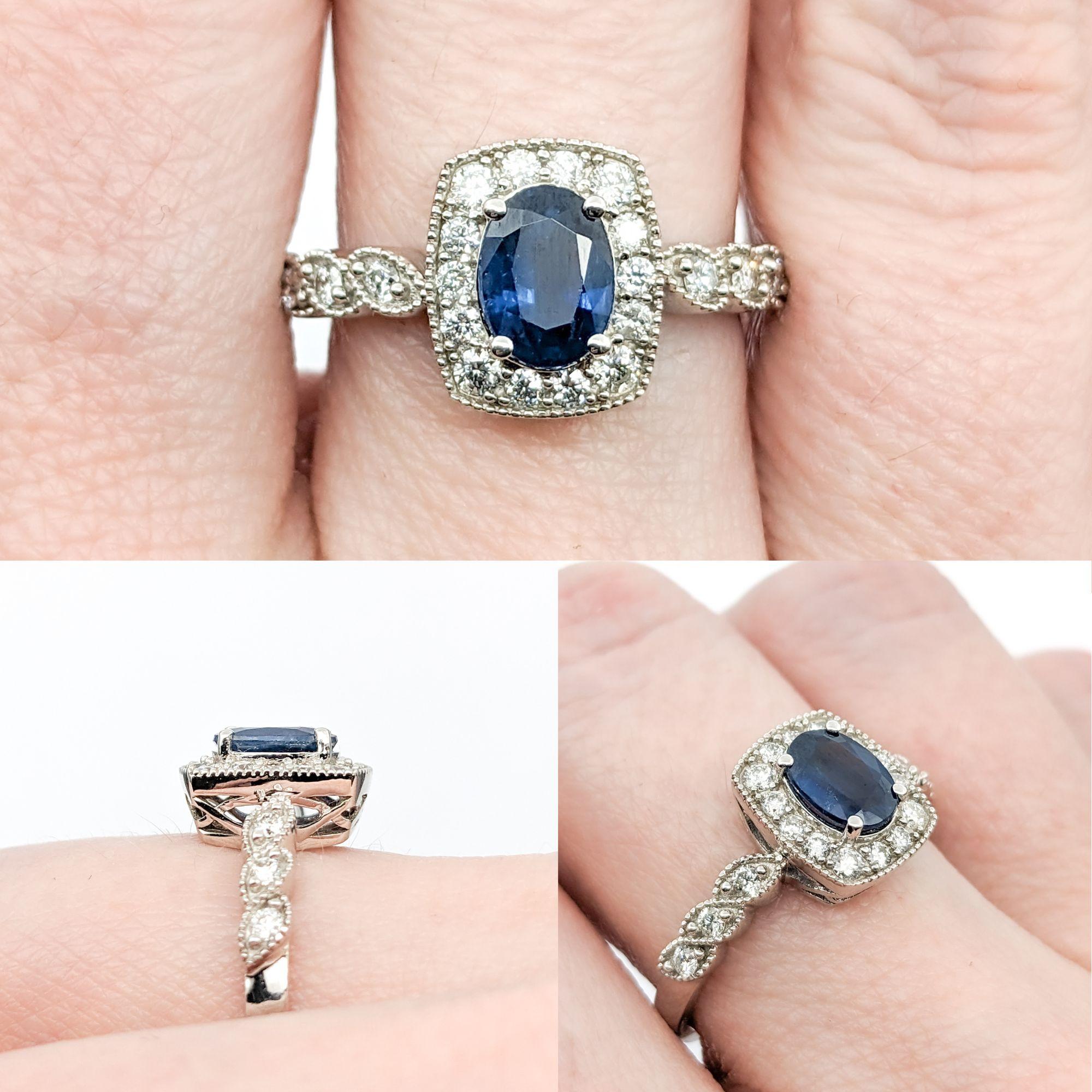 1.56ct Blue Sapphire & Diamond Ring In White Gold

This exquisite ring, fashioned from 14kt white gold, showcases a stunning 1.56ct sapphire centerpiece. This majestic sapphire is complemented by 0.36ctw of round diamonds, which are of VS clarity