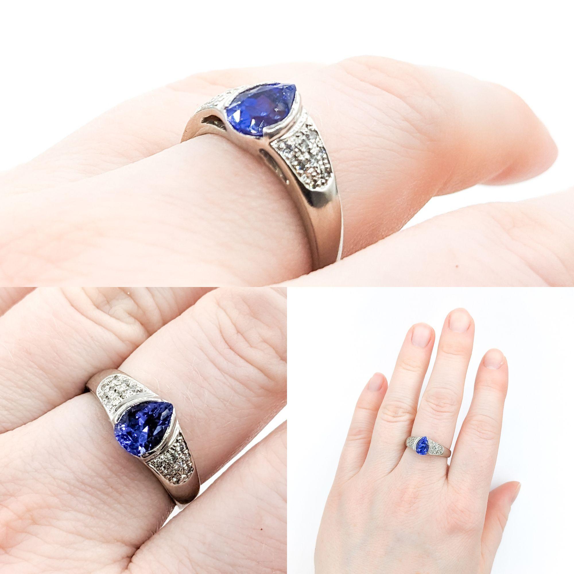 1.56ct Blue Tanzanite & Diamond Ring In Platinum


Unveil the splendor of this Gemstone Fashion Ring, meticulously handcrafted in 900pt Platinum. At its heart lies a mesmerizing 1.56ct Blue Tanzanite, elegantly encased in a half bezel setting that