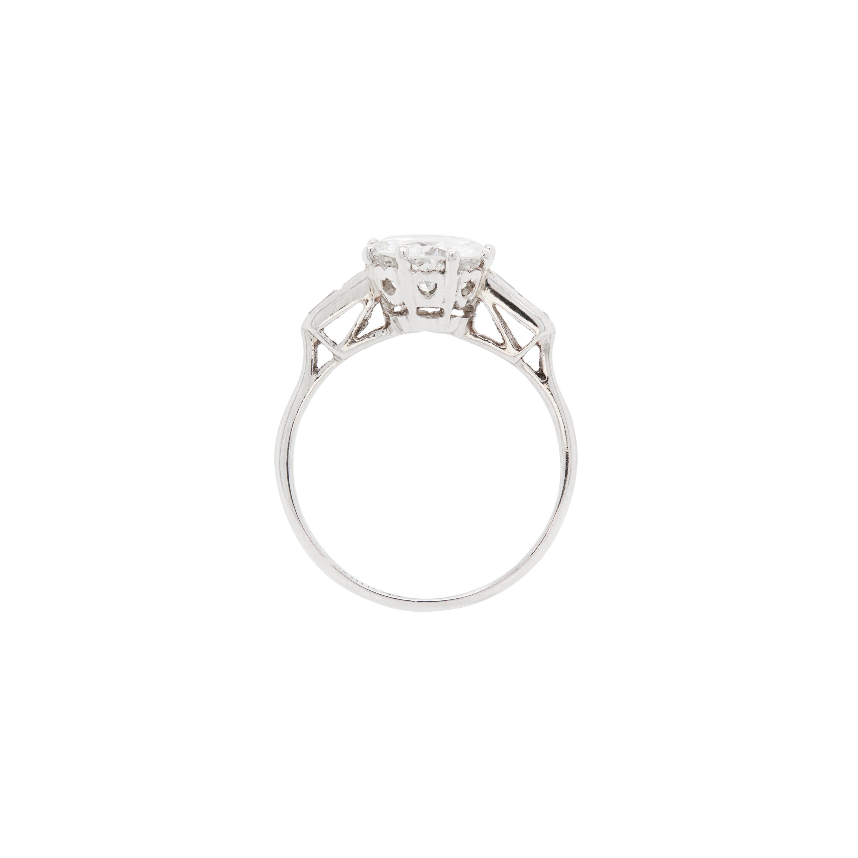 Introducing an absolutely stunning platinum engagement ring, dating back to around the 1920s

The exquisite ring centres a wonderful 1.56 carat transitional cut diamond beautifully mounted in a delicate eight claw, open back setting, atop an