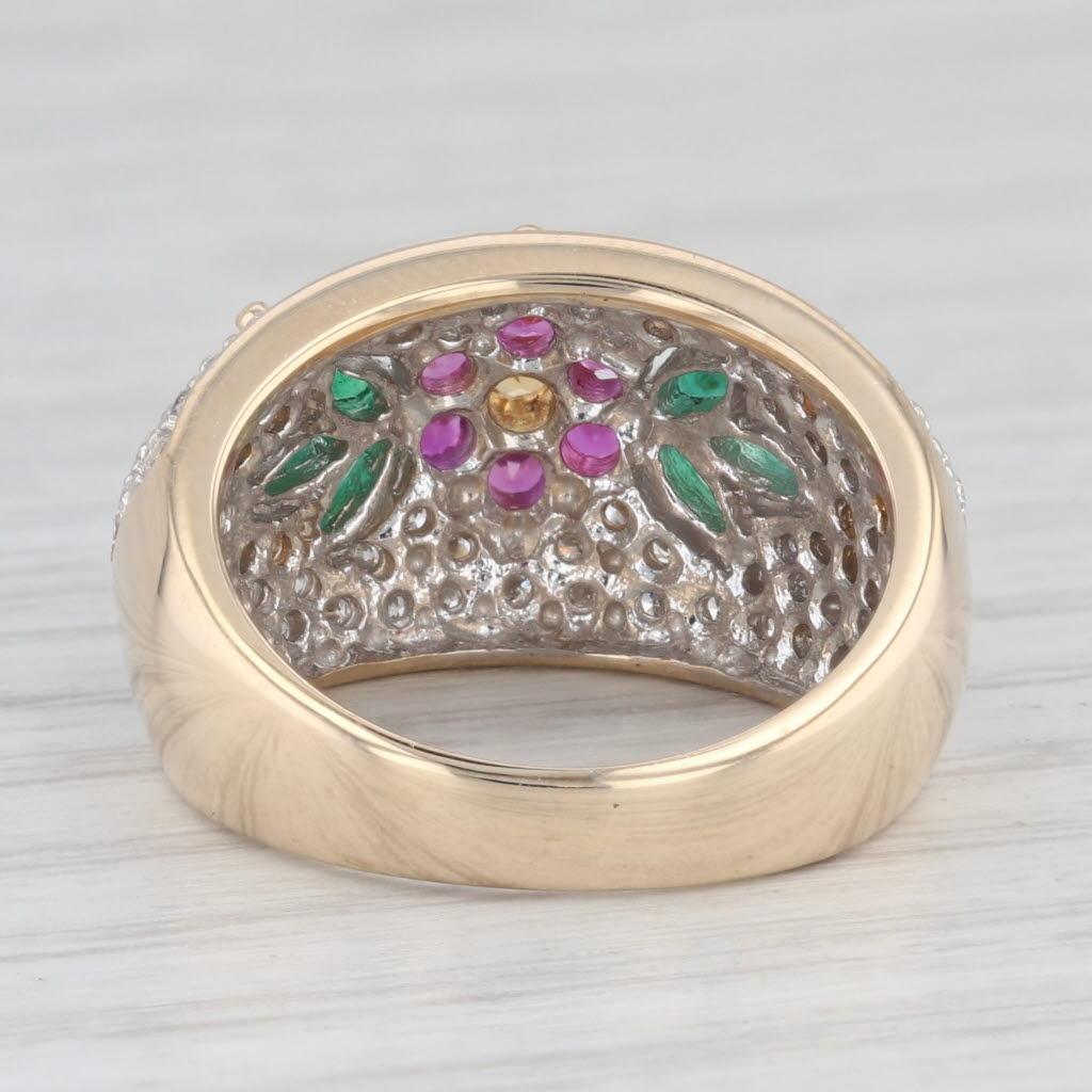 Gemstone Information:
- Natural Diamonds -
Total Carats - 0.60ctw
Cut - Round Brilliant
Color - F - H
Clarity - SI2 - I1

- Natural Emeralds -
Total Carats - 0.44ctw
Cut - Marquise Brilliant
Color - Green
Treatment - Oiling

- Natural Rubies -
Total