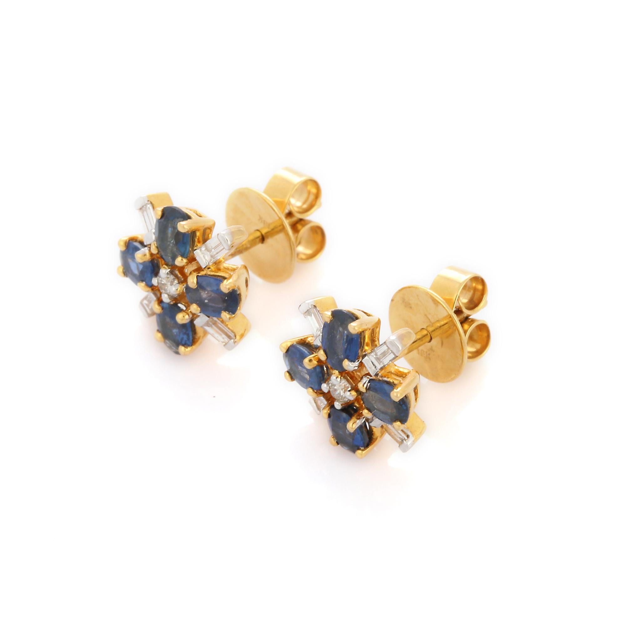 Studs create a subtle beauty while showcasing the colors of the natural precious gemstones and illuminating diamonds making a statement.

Oval cut blue sapphire studs with diamonds in 18K gold. Embrace your look with these stunning pair of earrings