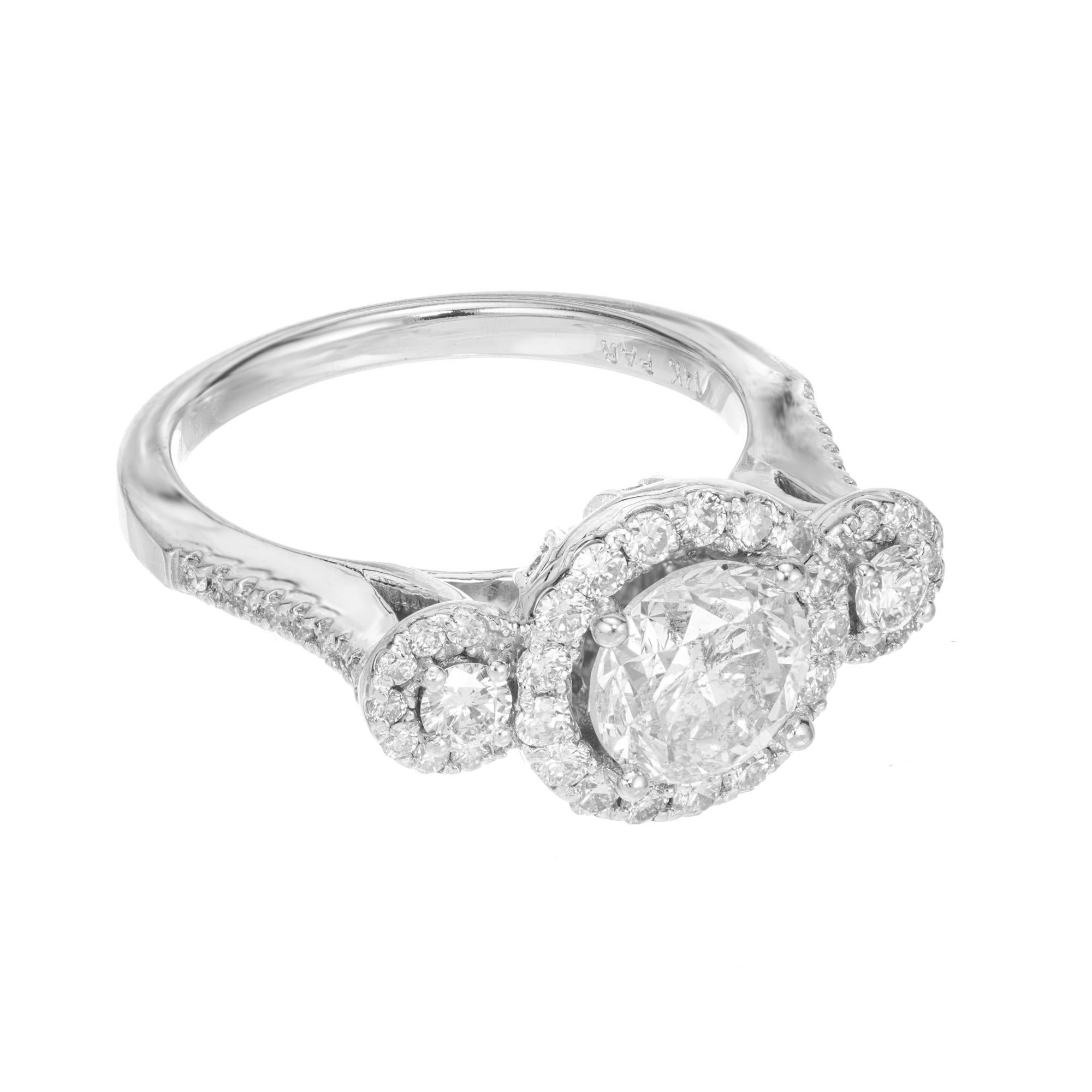 three stone halo engagement ring