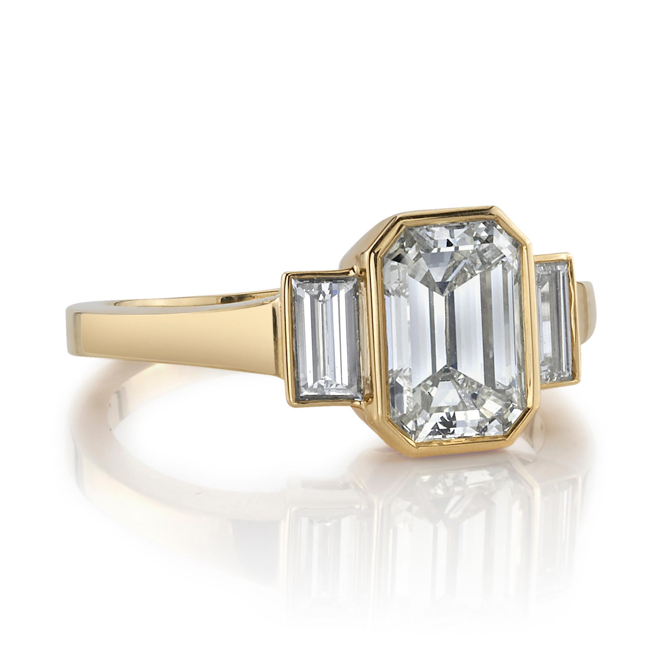 1.57ct N/VS1 GIA certified Emerald cut diamond with 0.40ctw baguette accents set in a beautifully handcrafted 18k yellow gold ring. This Art Deco inspired ring shares clean lines and a low profile design.

Ring is currently a size 6 and can be sized