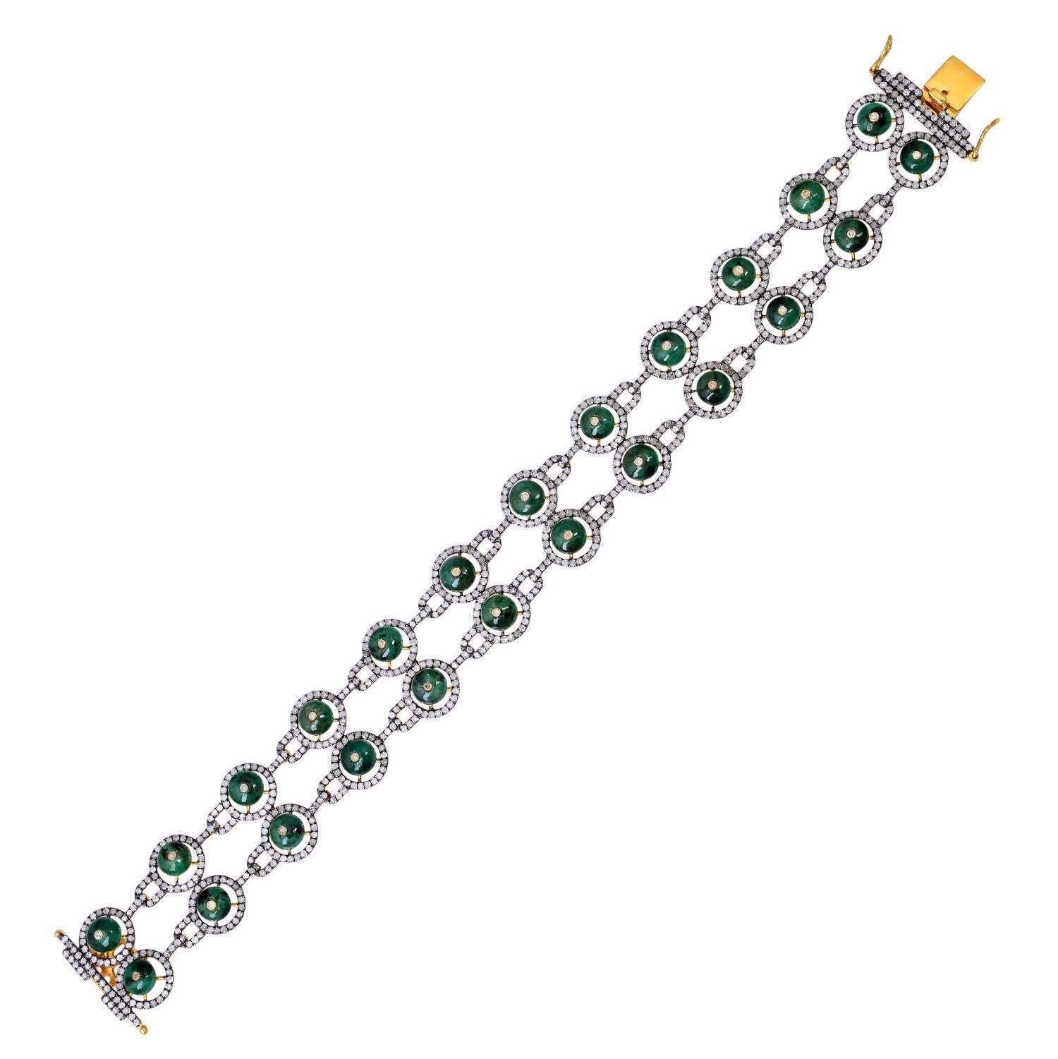 A stunning bracelet handmade in 18K gold and sterling silver.  It is set in 15.7 carats emerald and 4.15 carats of sparkling diamonds.  Total length 7 inches. Clasp Closure.
Instock

FOLLOW  MEGHNA JEWELS storefront to view the latest collection &