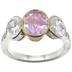 1.57 Carat Fancy Intense Purple-Pink Oval Cut Ring