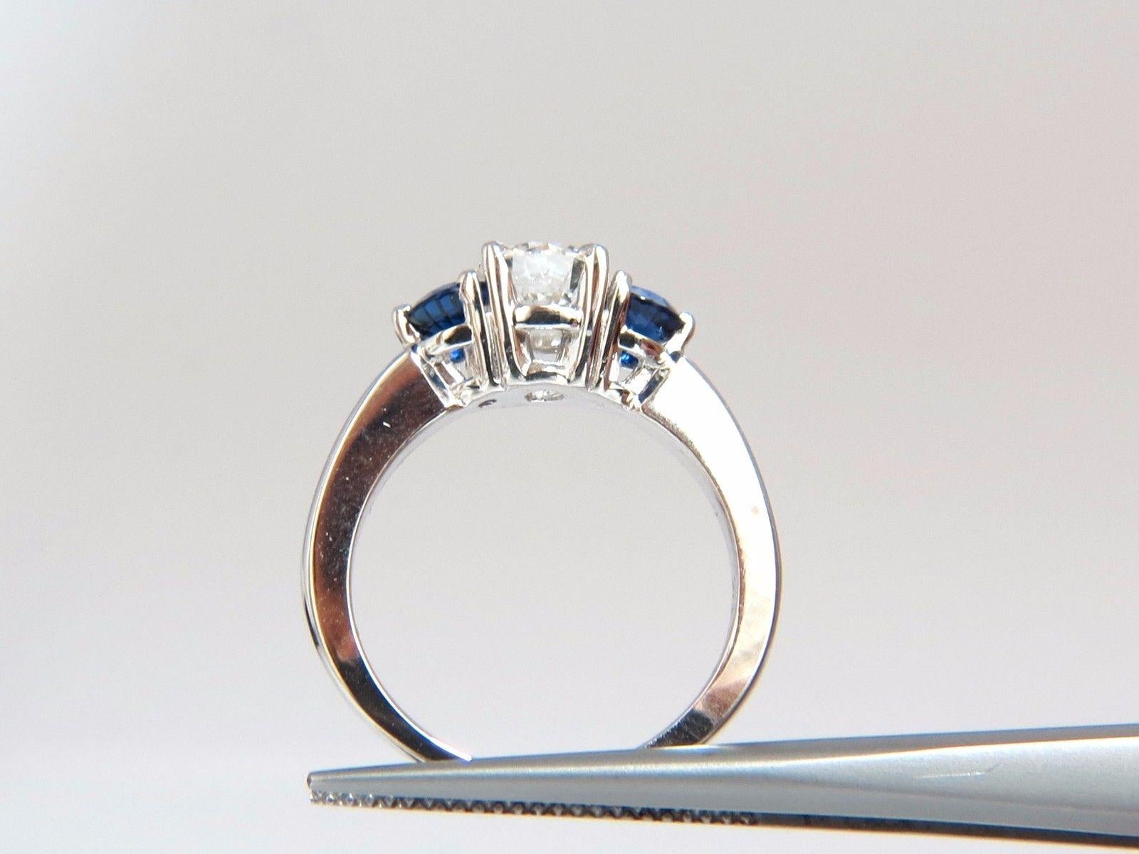 Round Cut 1.57 Carat Natural Diamonds Sapphire Three-Stone Ring 14 Karat Royal Blue For Sale