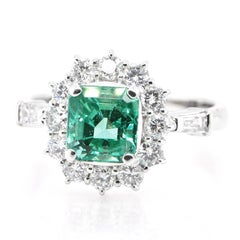 1.57 Carat Natural Emerald and Diamond Ring Set in Platinum