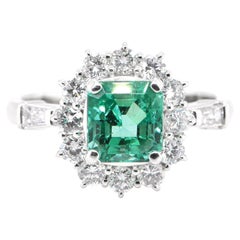 1.57 Carat Natural Emerald and Diamond Ring Set in Platinum