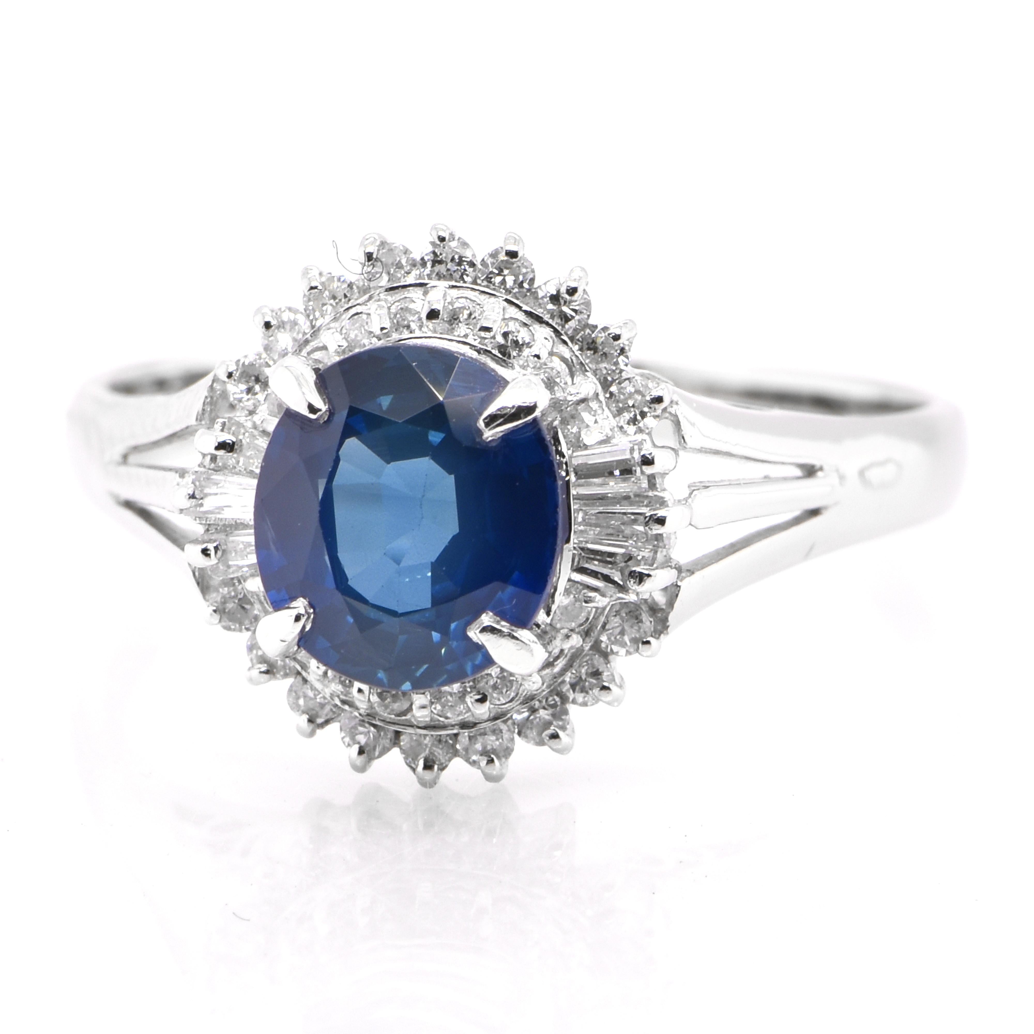 A beautiful ring featuring 1.57 Carat Natural Blue Sapphire and 0.32 Carats Diamond Accents set in Platinum. Sapphires have extraordinary durability - they excel in hardness as well as toughness and durability making them very popular in jewelry.