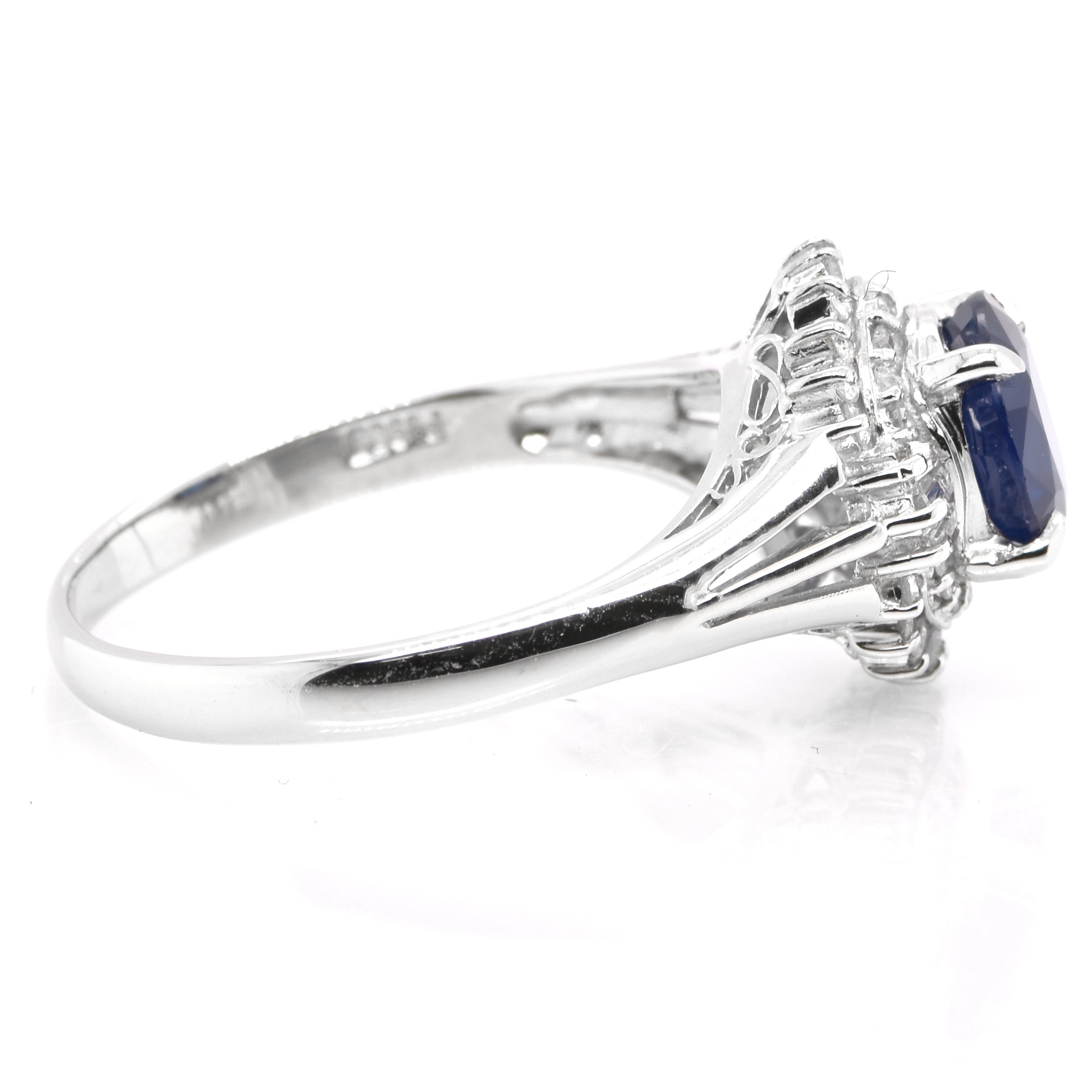 Oval Cut 1.57 Carat Natural Sapphire and Diamond Ballerina Cocktail Ring set in Platinum For Sale