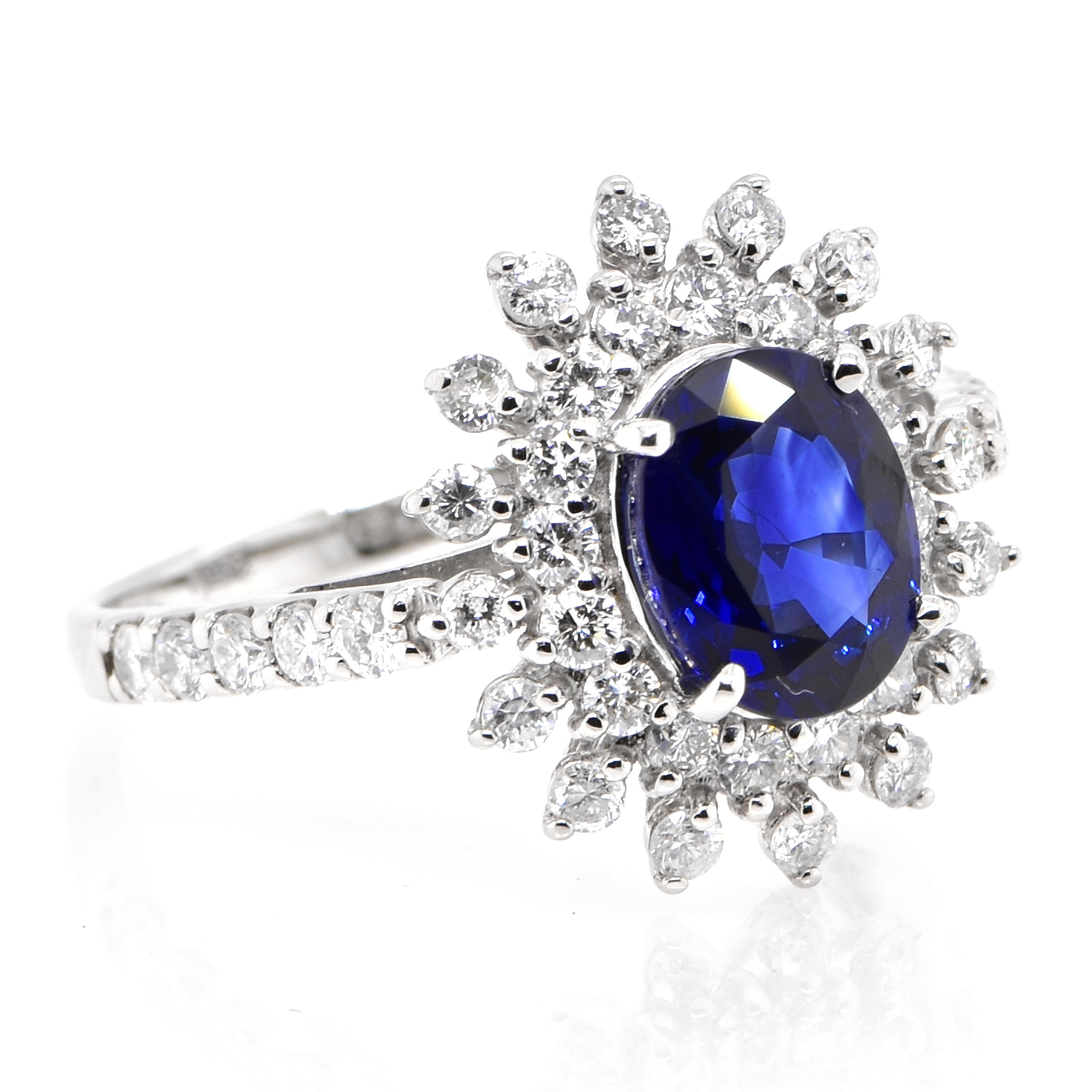 Modern 1.57 Carat Natural Sapphire and Diamond Double Halo Ring Made in Platinum For Sale