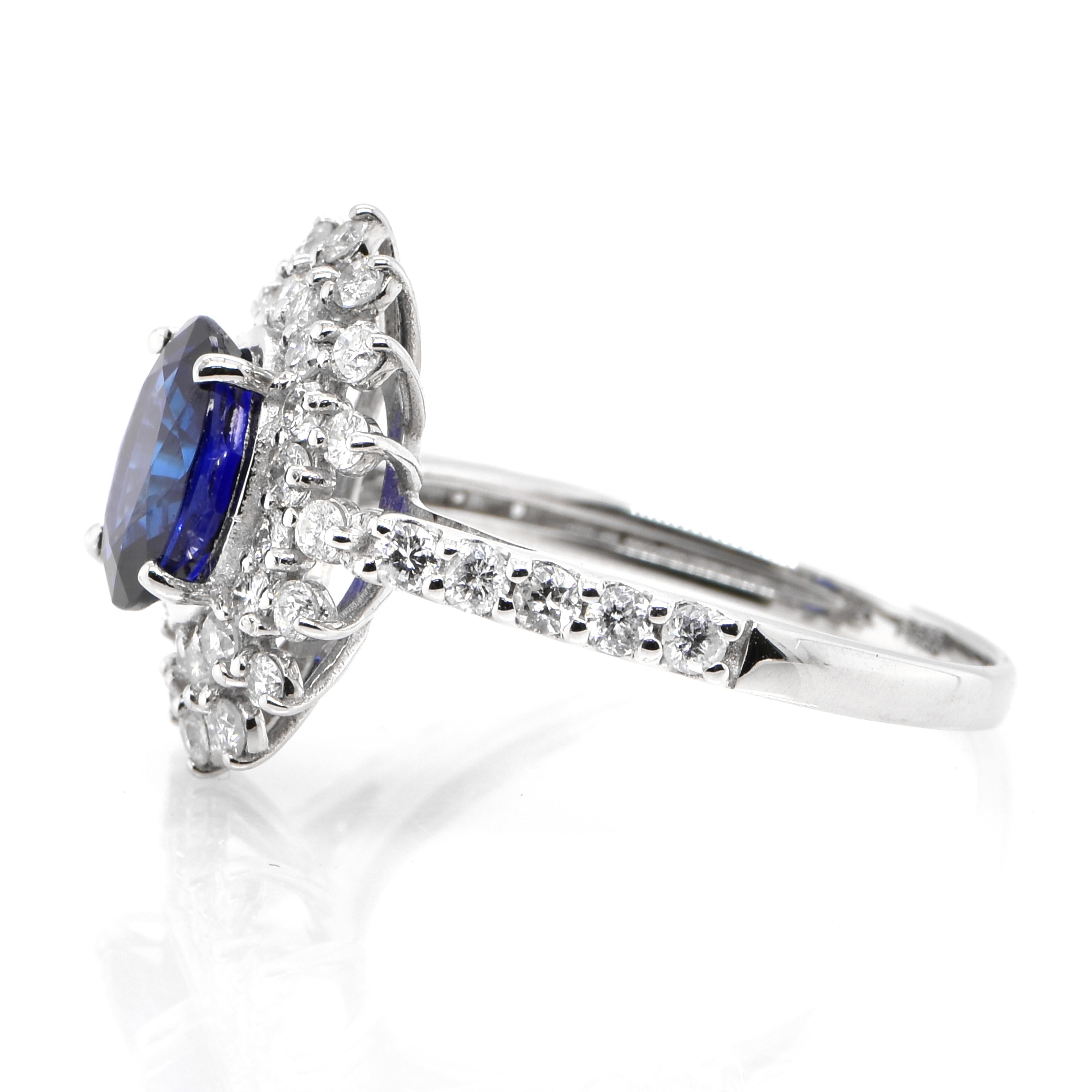 Oval Cut 1.57 Carat Natural Sapphire and Diamond Double Halo Ring Made in Platinum For Sale