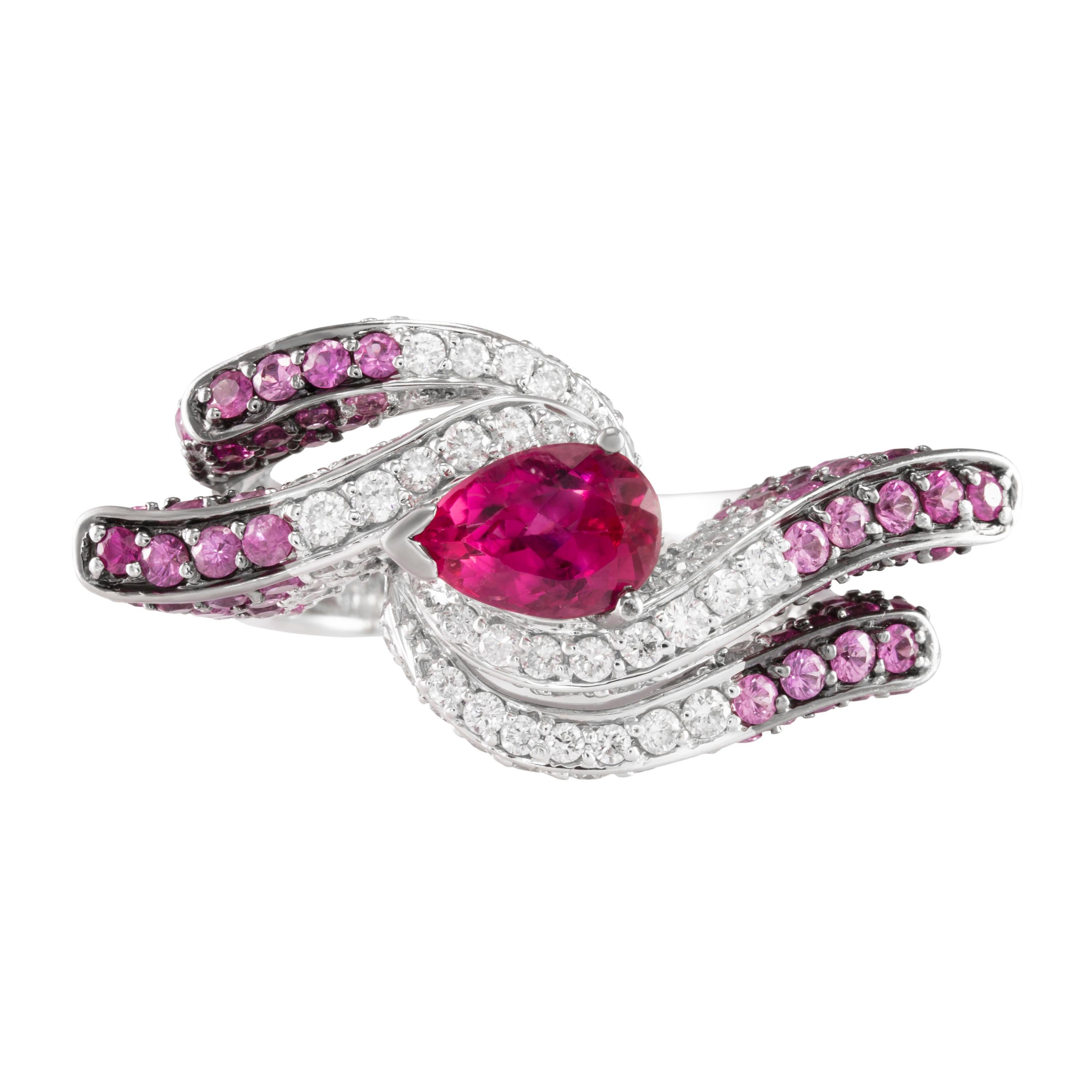 Butani's 18-karat white gold cocktail ring is encrusted with 1.15 carats of shimmering white diamonds, 2.69 carats of pink sapphires, 0.23 carats of rubies and centered with a sideways-set 1.57 carat pear-shape rubelite.  These precious jewels have