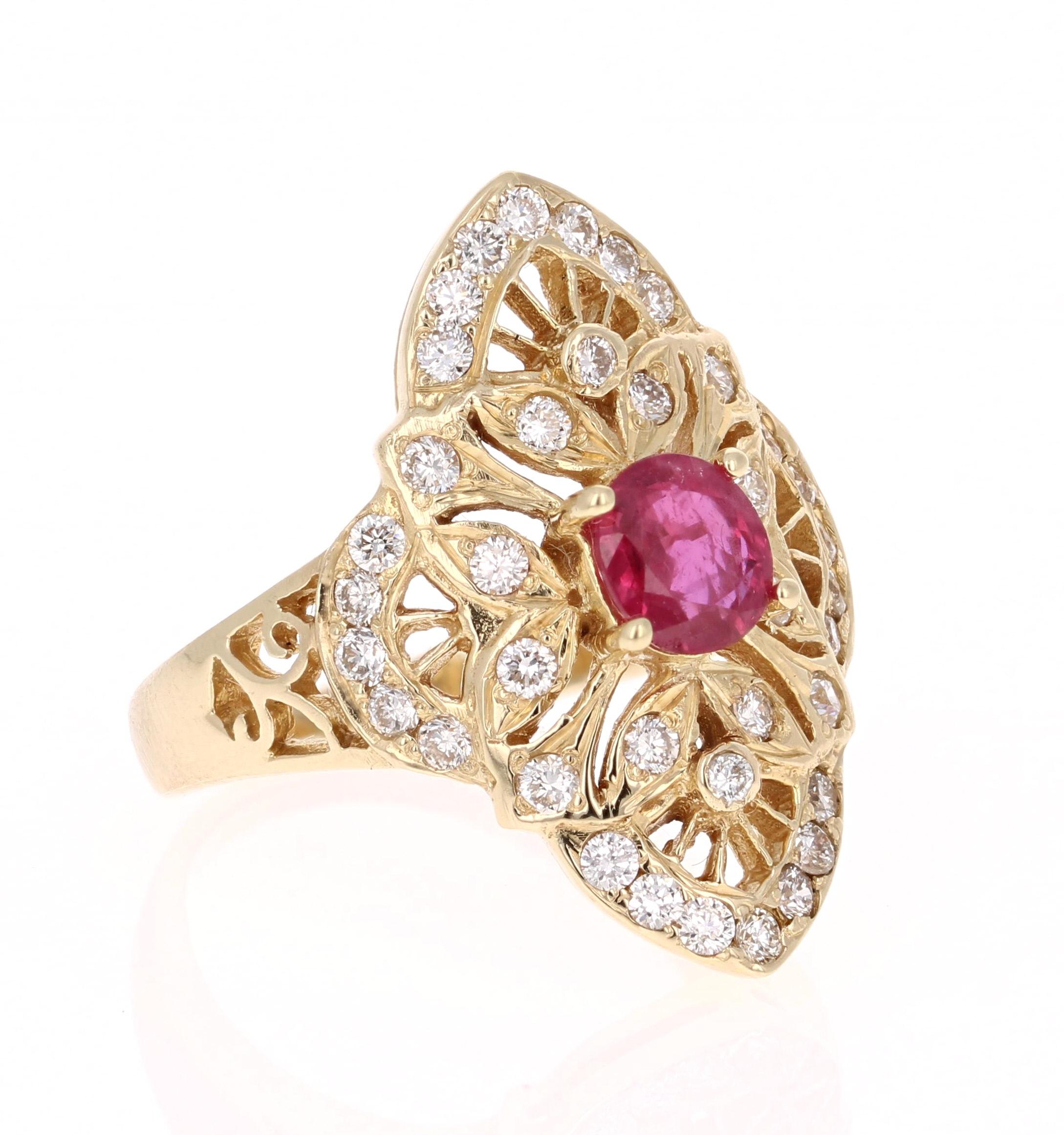 This Art-Deco Inspired Ring is truly a unique vintage beauty! The Oval Cut Ruby is 0.84 carats and is surrounded by 38 Round Cut Diamonds that weigh 0.73 carat (Clarity: VS2, Color: H).  The total carat weight of the ring is 1.57 carats.  The ring