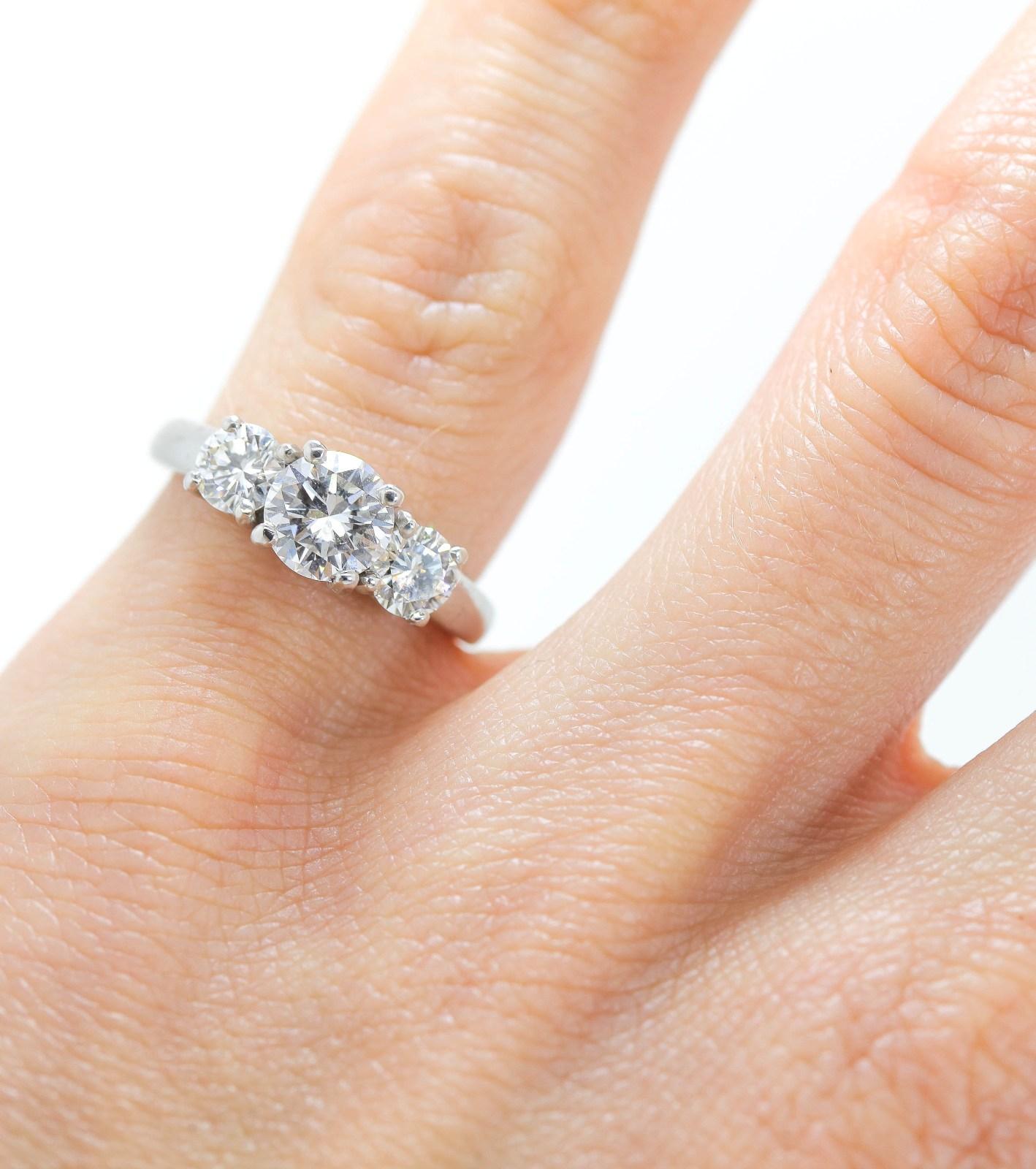 Modern 1.57 Carat Three-Stone Diamond Platinum Ring For Sale