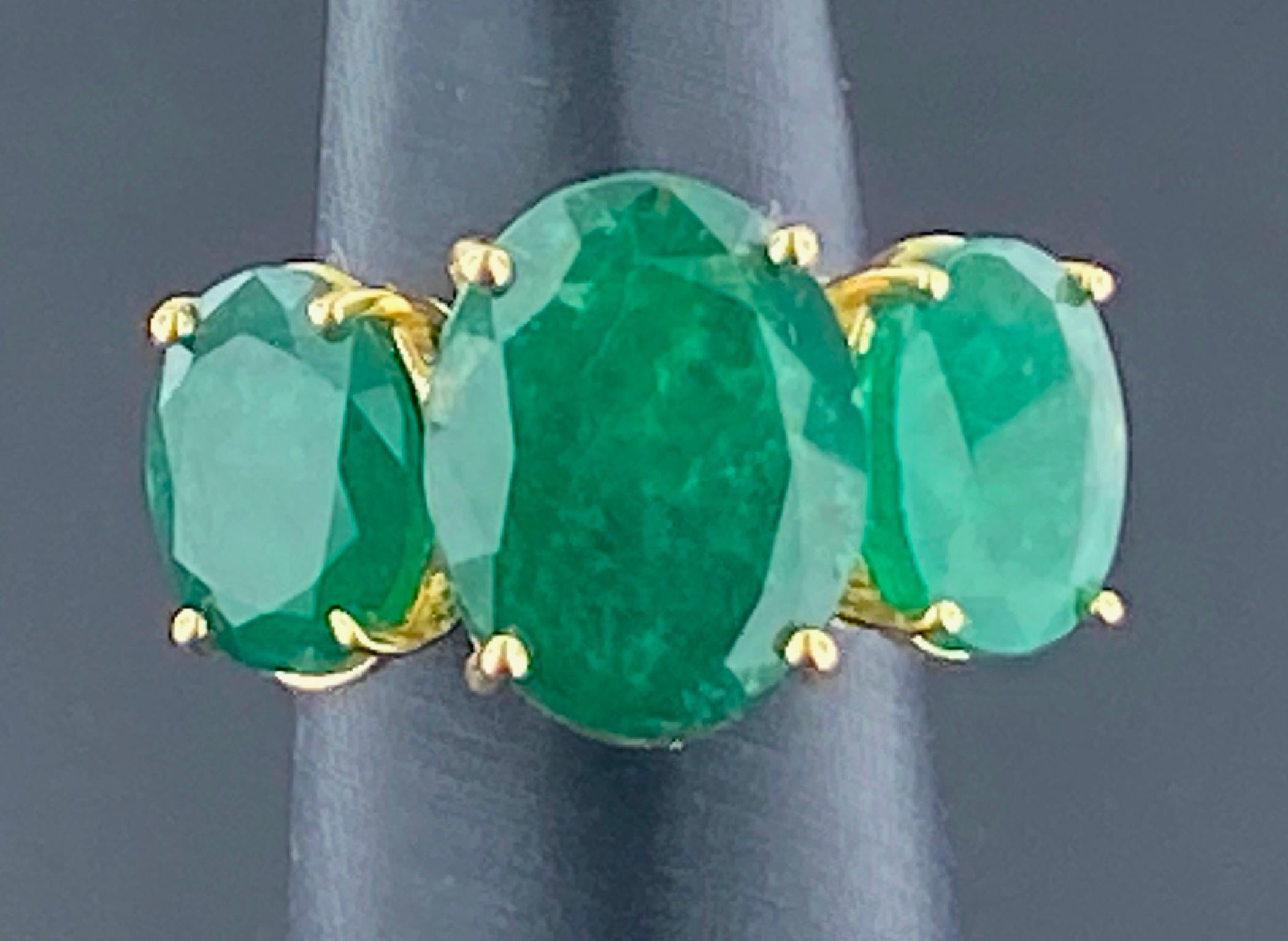 Women's or Men's 15.77 Carat 3-Stone Oval Cut Emerald Ring For Sale