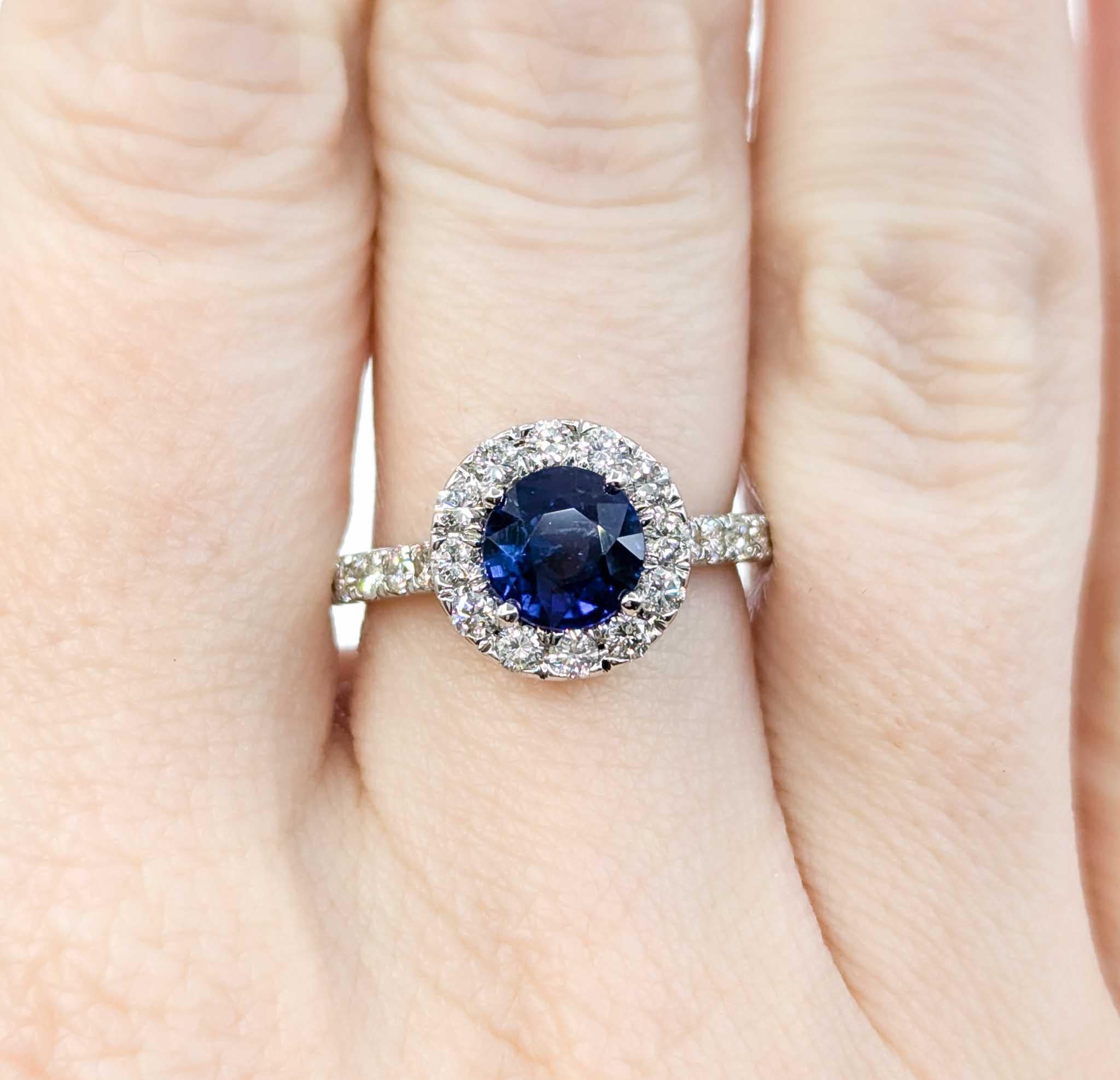 Contemporary 1.57ct Blue Sapphire & Diamond Halo Ring in White Gold For Sale