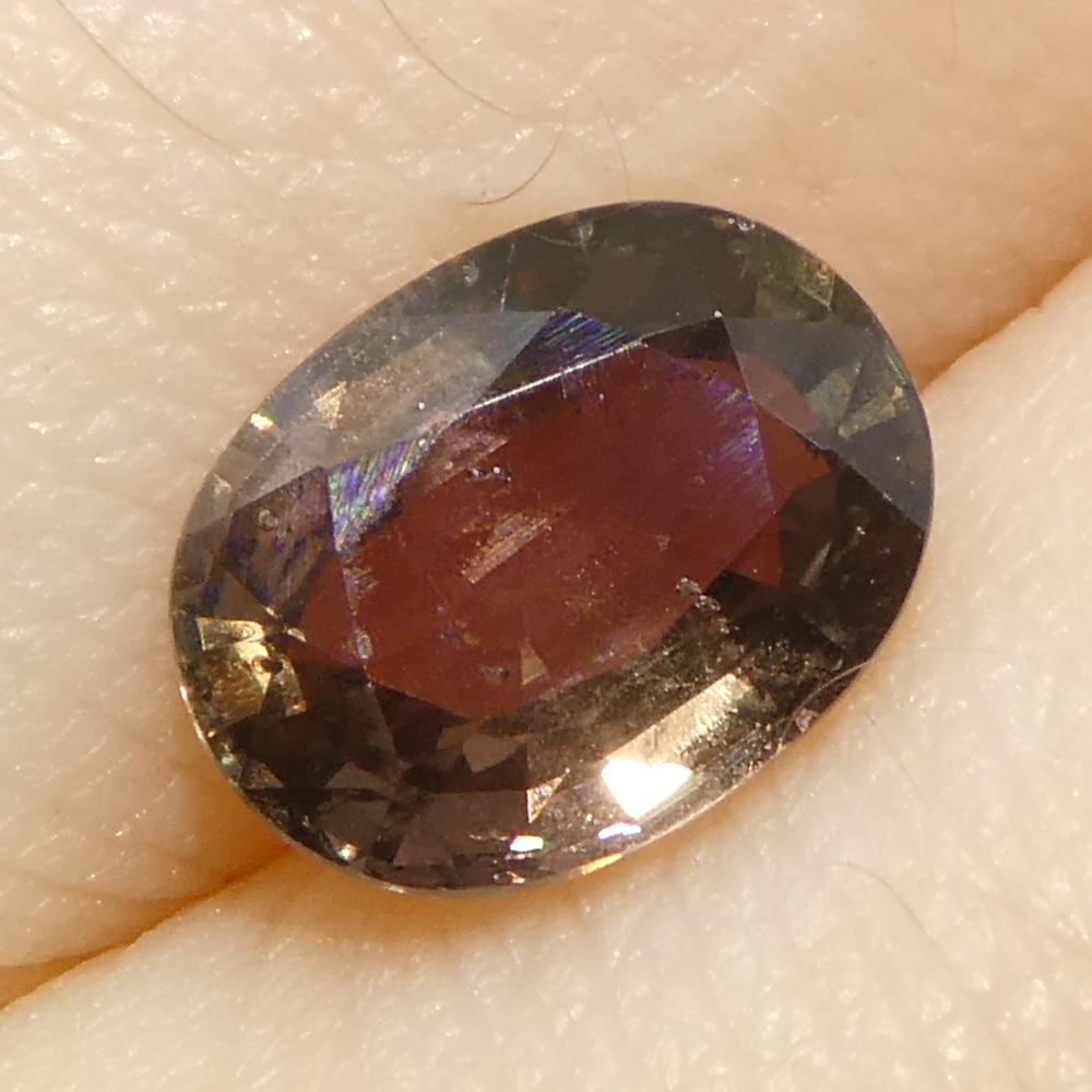 1.57ct Oval Brownish Pink Sapphire from Tanzania For Sale 8