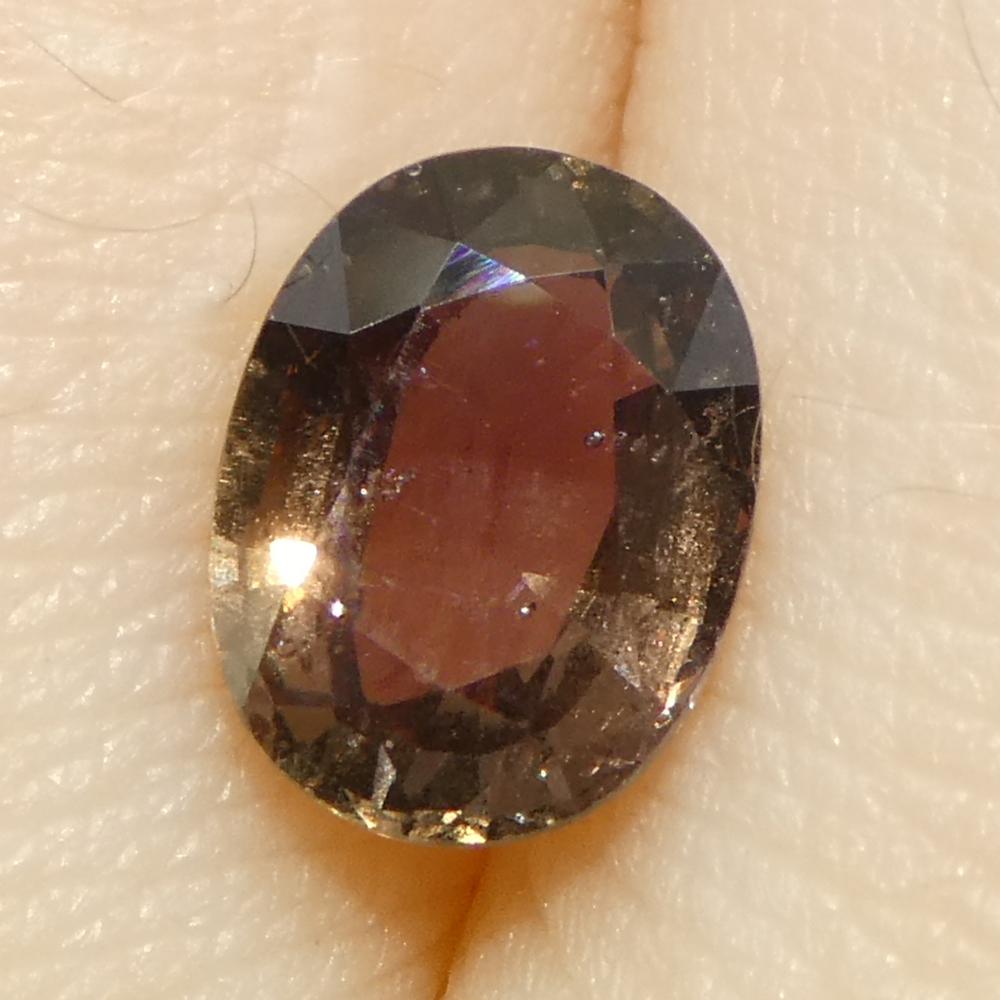 1.57ct Oval Brownish Pink Sapphire from Tanzania For Sale 9