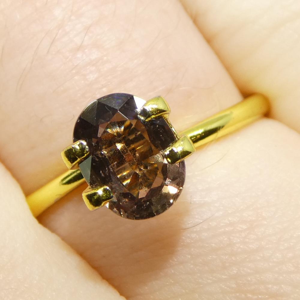 Brilliant Cut 1.57ct Oval Brownish Pink Sapphire from Tanzania For Sale