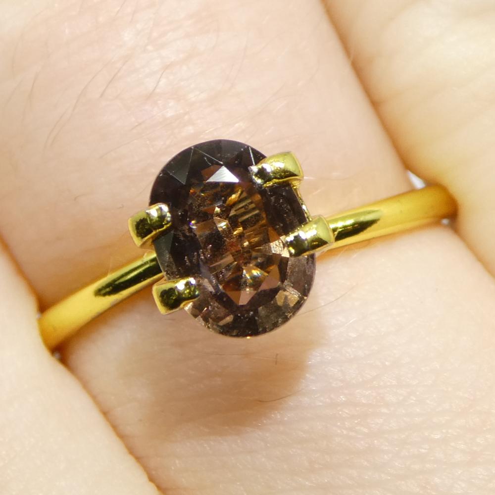 Women's or Men's 1.57ct Oval Brownish Pink Sapphire from Tanzania For Sale
