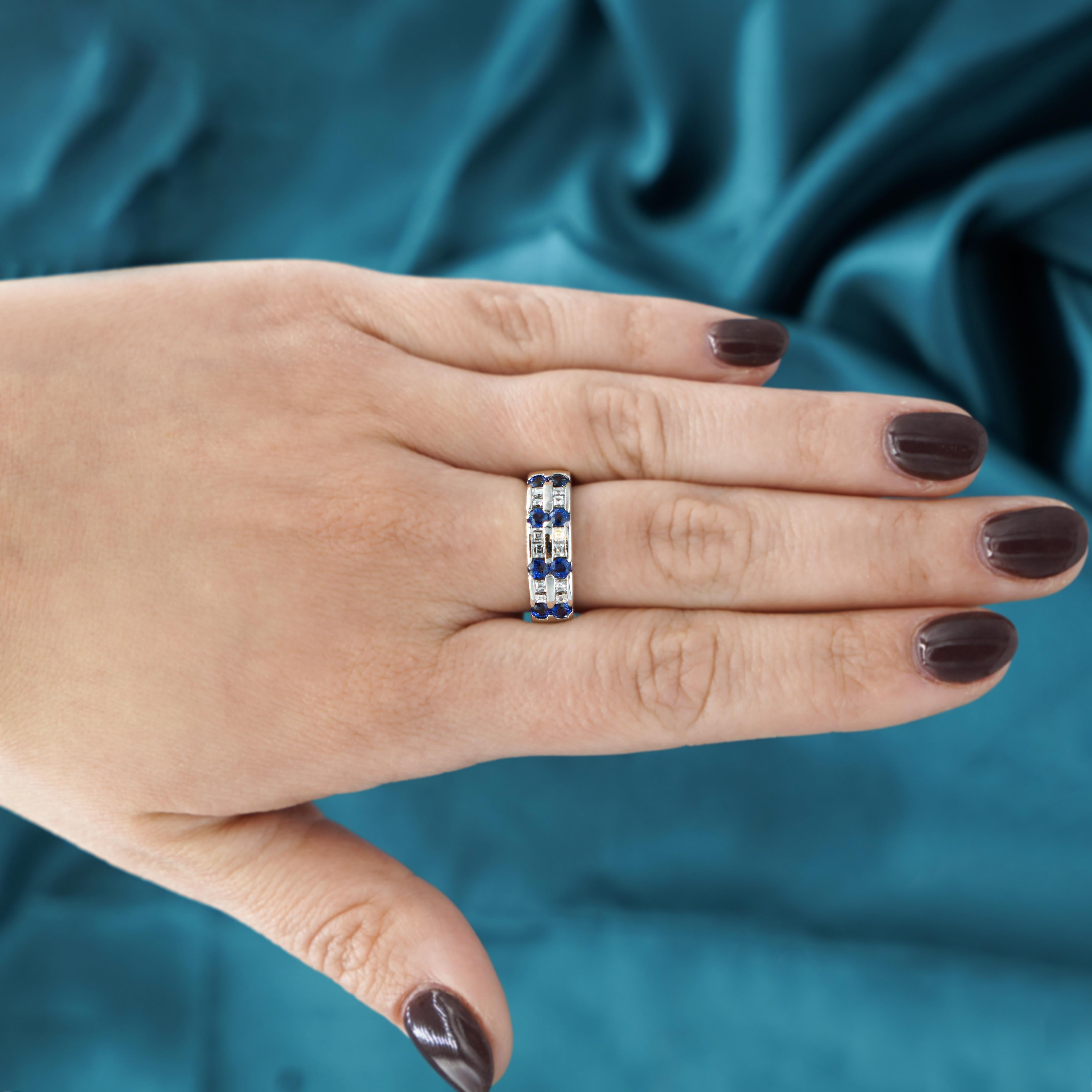 A refined platinum 6mm band featuring 1.12 carats of deep blue sapphires and 0.46 carats of shimmering baguette diamonds. Set in double layered two row channel setting with optimal coverage on the finger. This platinum band offers a striking balance