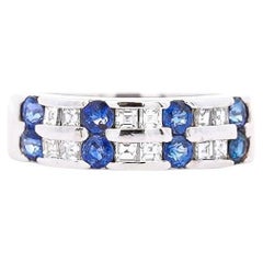 Anillo de platino con zafiro redondo azul de 1,58 quilates y diamante baguette de 6 mm