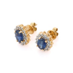 1.58 Carat Blue Sapphire and Diamond Earrings Studded in 18K Solid Yellow Gold