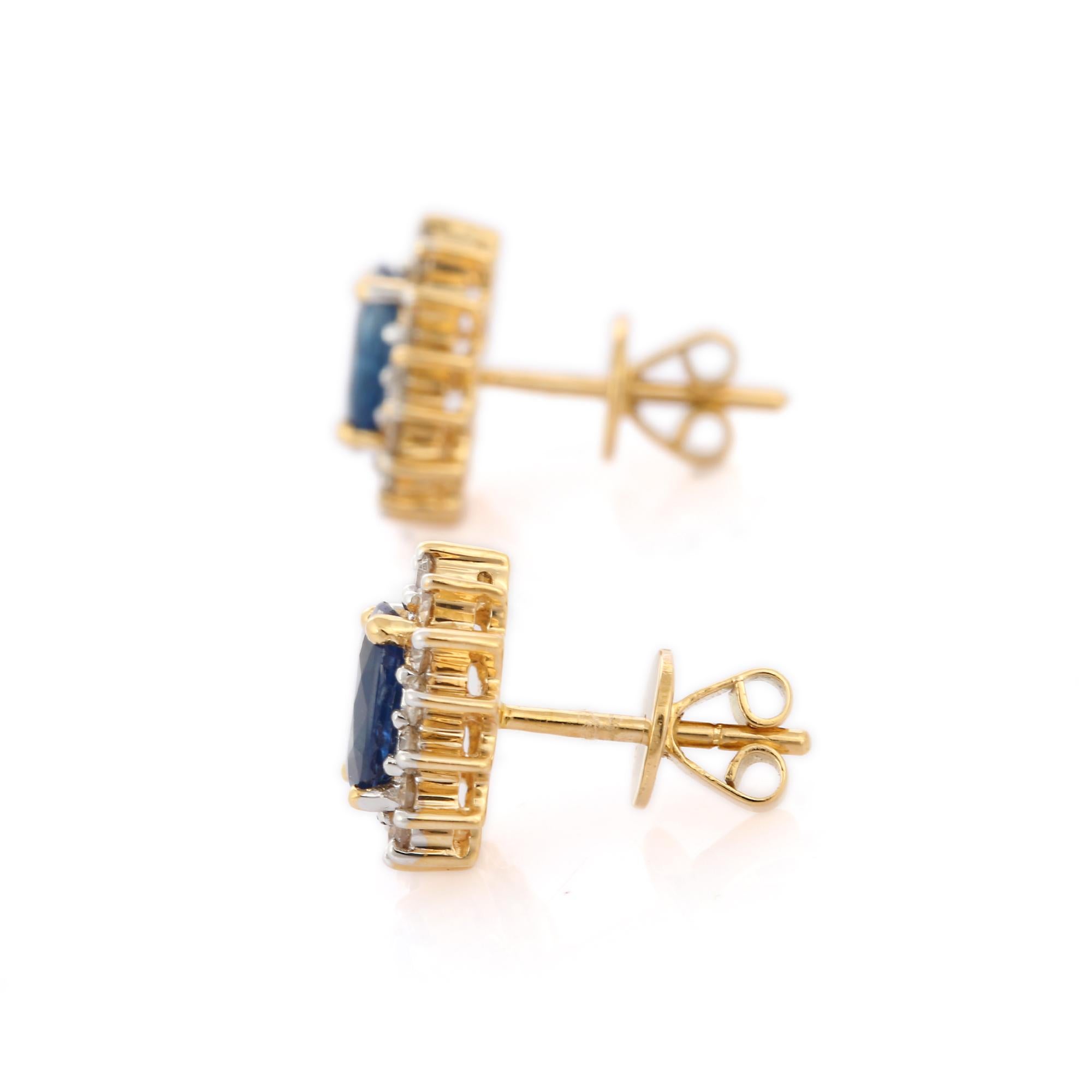 Oval Cut 1.58 Carat Blue Sapphire and Diamond Earrings Studded in 18K Solid Yellow Gold For Sale
