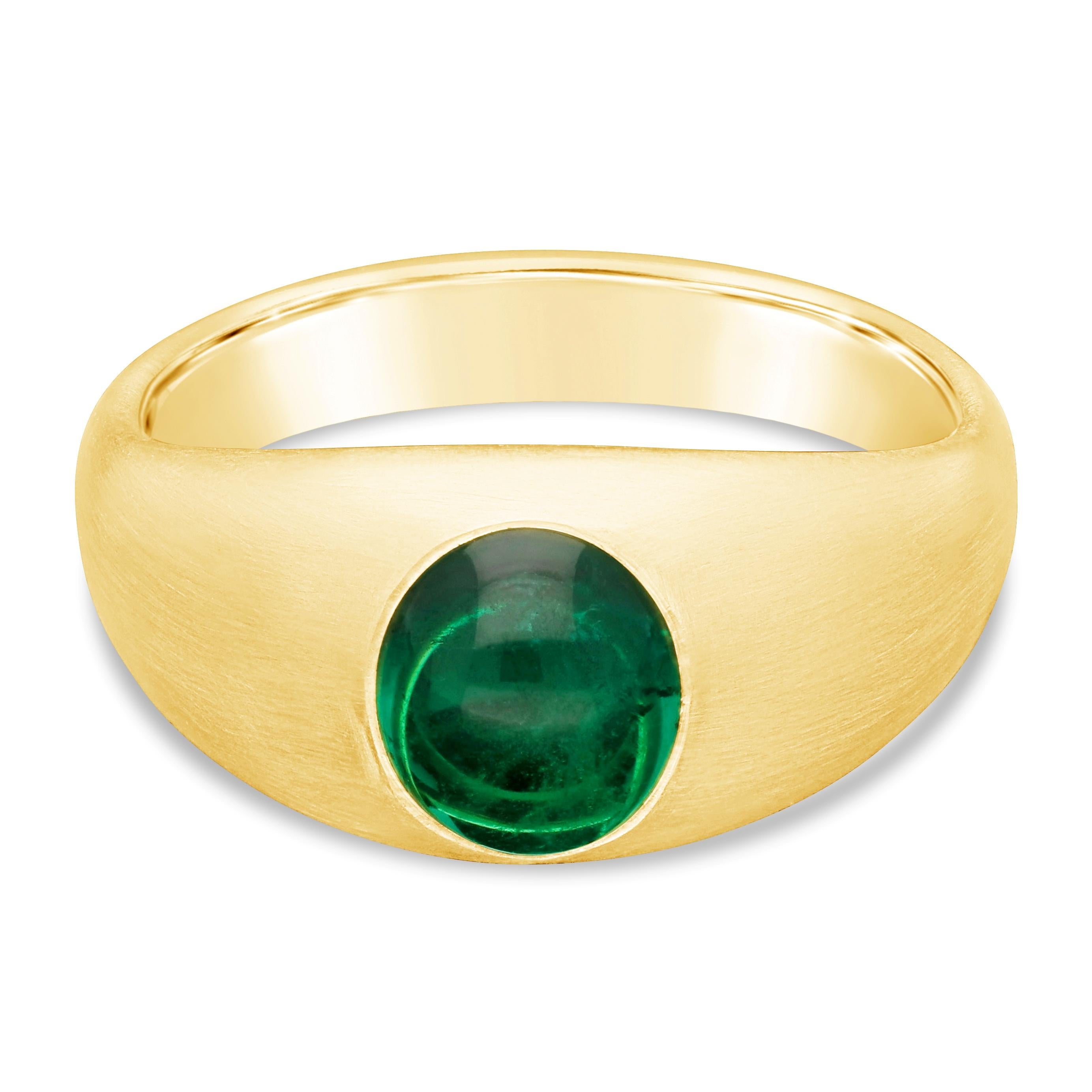 Beautiful gold and emerald gypsy-set ring by Hancocks, set to the centre with a lovely oval cabochon cut Colombian emerald weighing 1.58ct within a wonderfully rich and tactile 22ct yellow gold wide tapering band with satin finish.